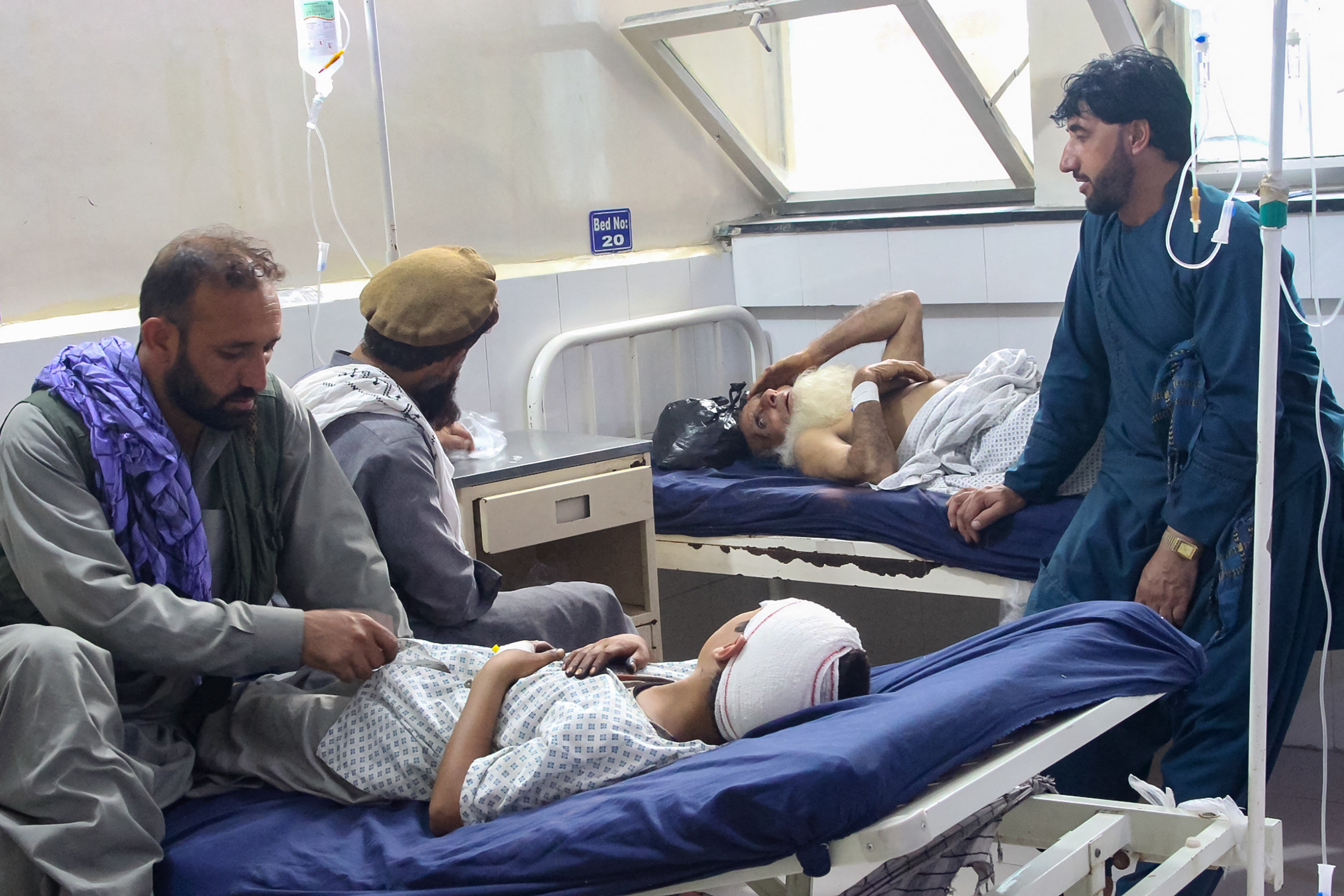 Injured Afghan people receive treatment at a hospital after an earthquake in Afghanistan