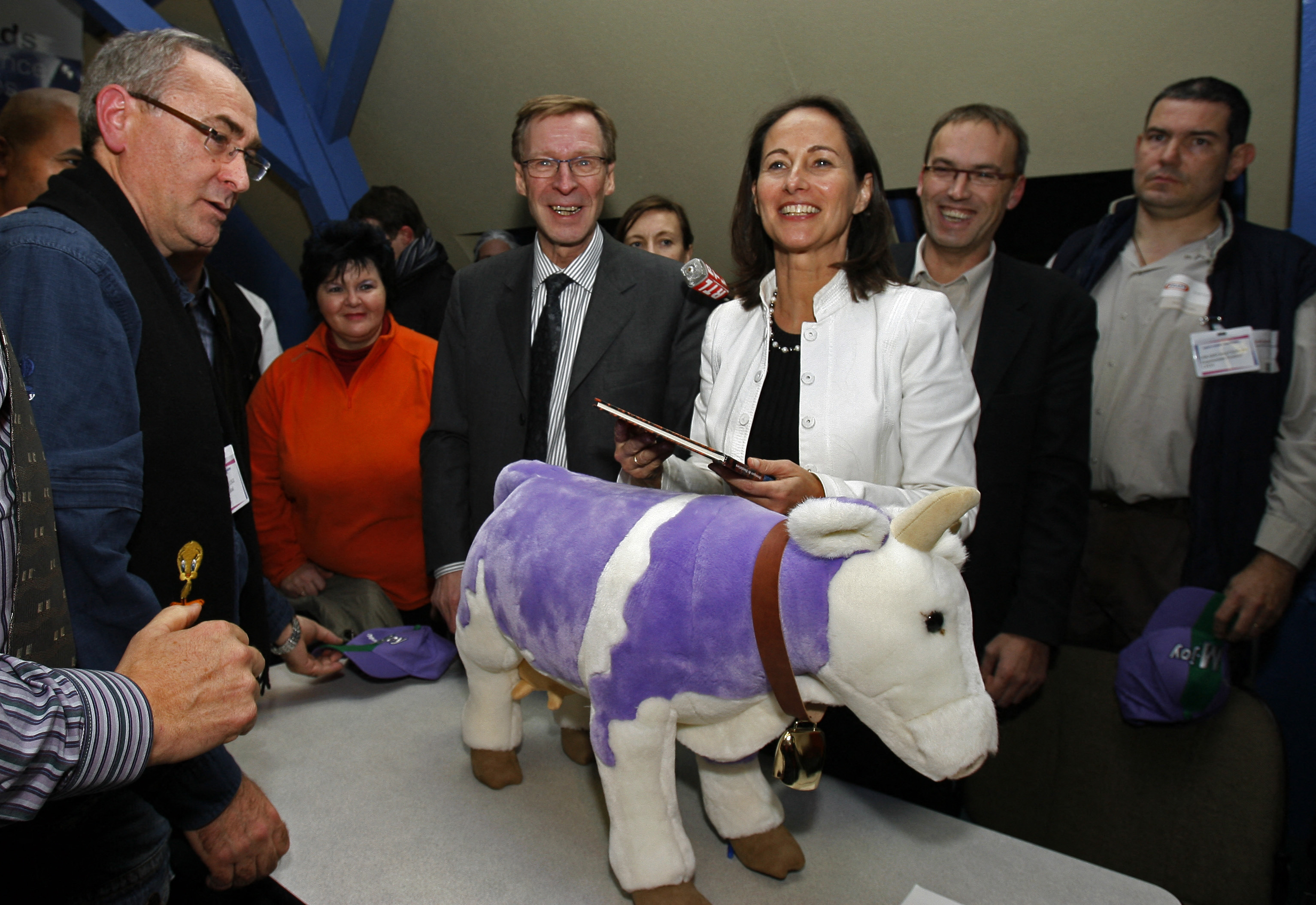 French socialist party candidate in next year's presidential election Segolene Royal poses with workers of the Milka chocolate factory prior to a meeting as part of her visit to Strasbourg's area