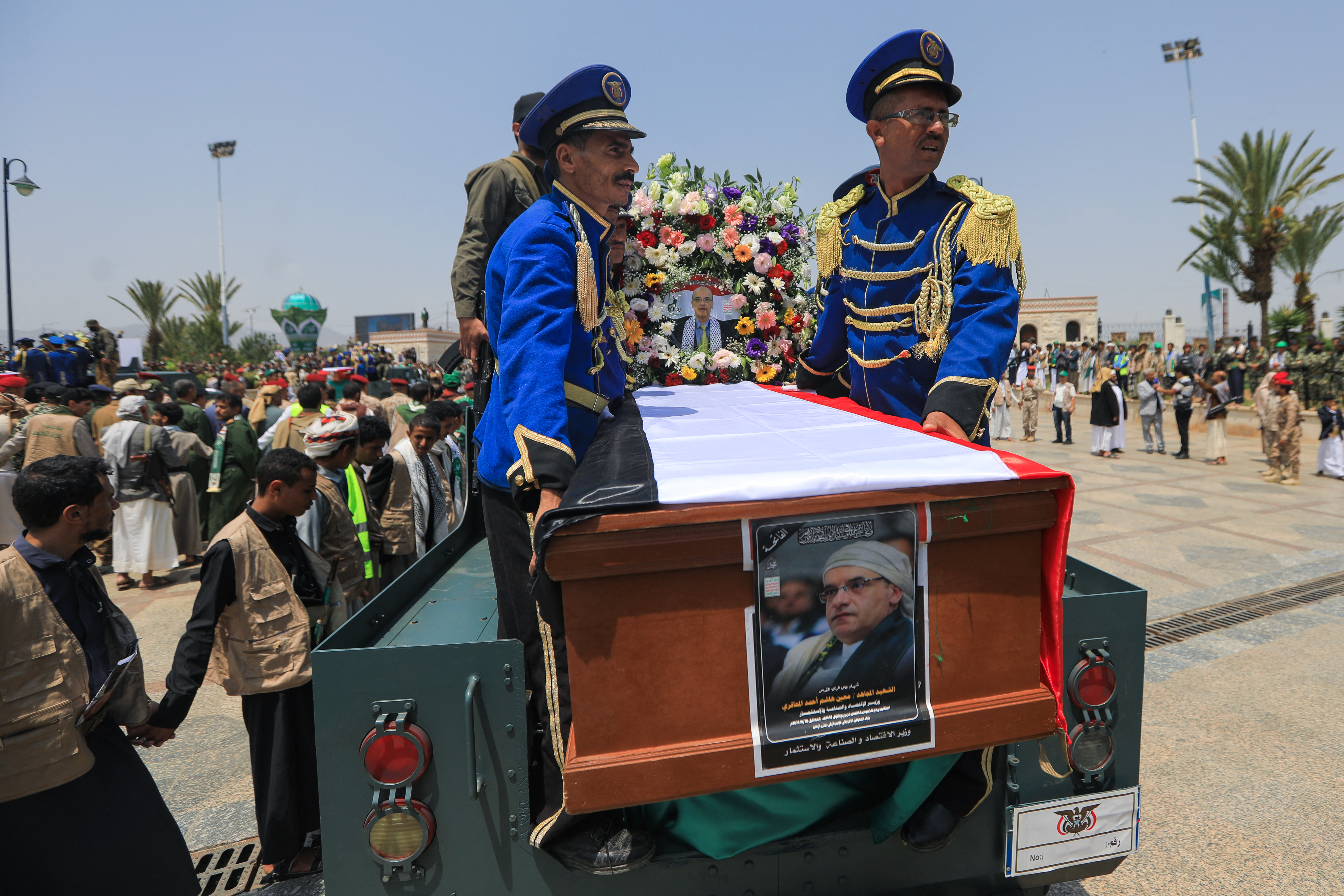 Yemeni honor guard transport the coffin of Minister of Industry of Yemen's Houthi-led government Mouin al-Mahaqri and other officials killed in an Israeli strike days earlier, during a funeral procession in Sanaa on September 1, 2025.