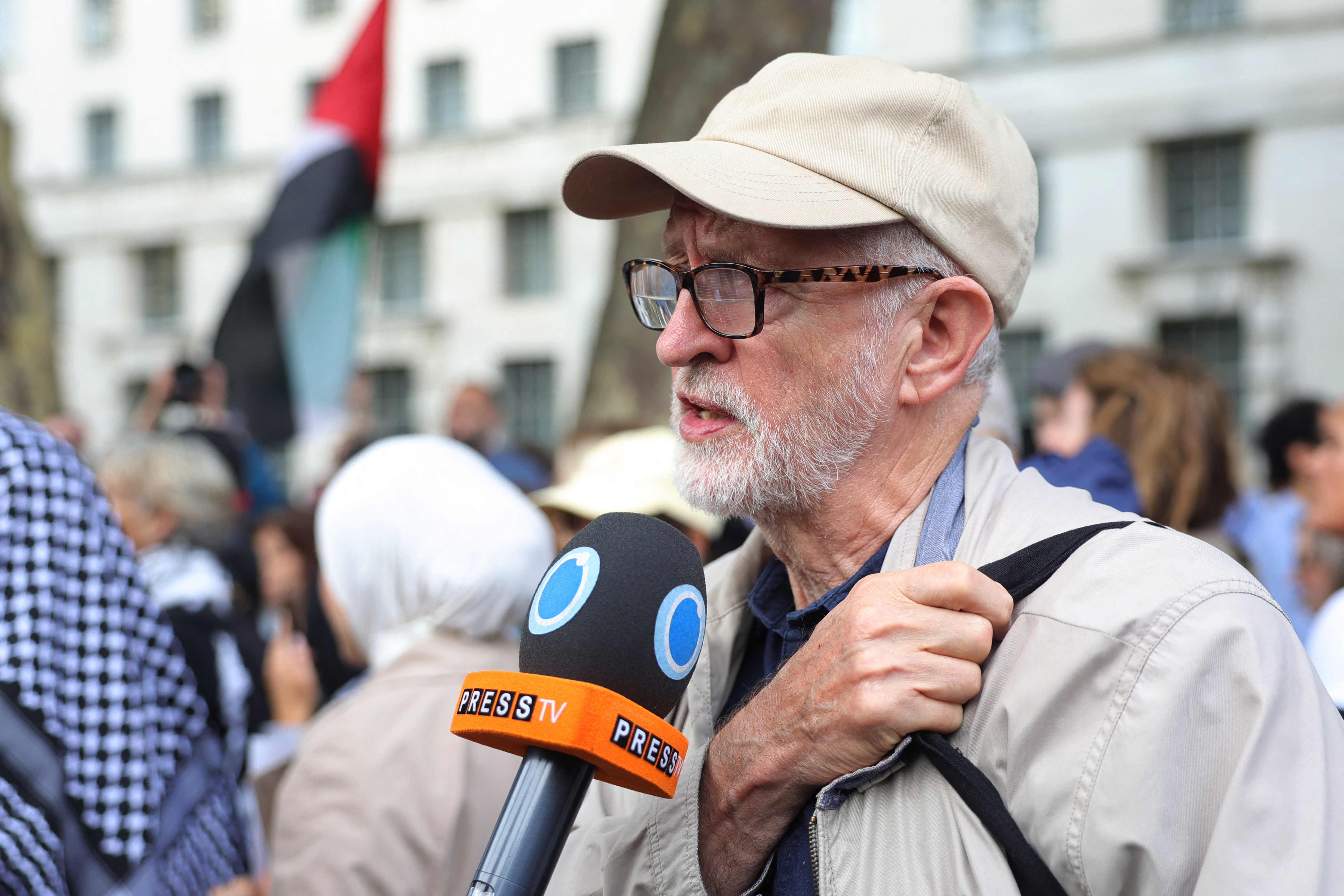 Former Labour party leader Jeremy Corbyn is interviewed at a vigil for journalists killed in Gaza outside Downing Street in central London