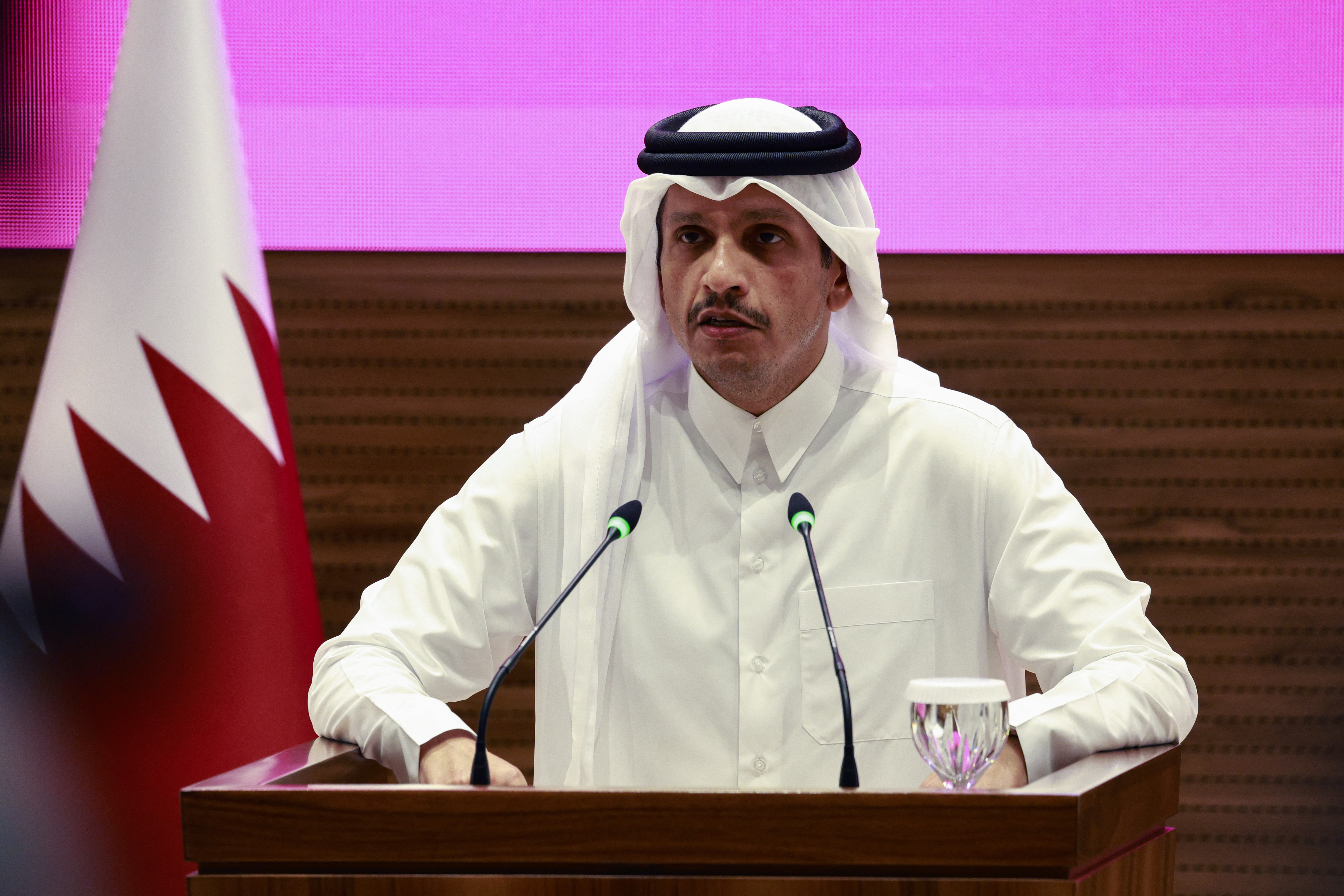 Qatar's Prime Minister and Foreign Minister Mohammed bin Abdulrahman al-Thani addresses a press conference following Israeli strikes in Doha  )