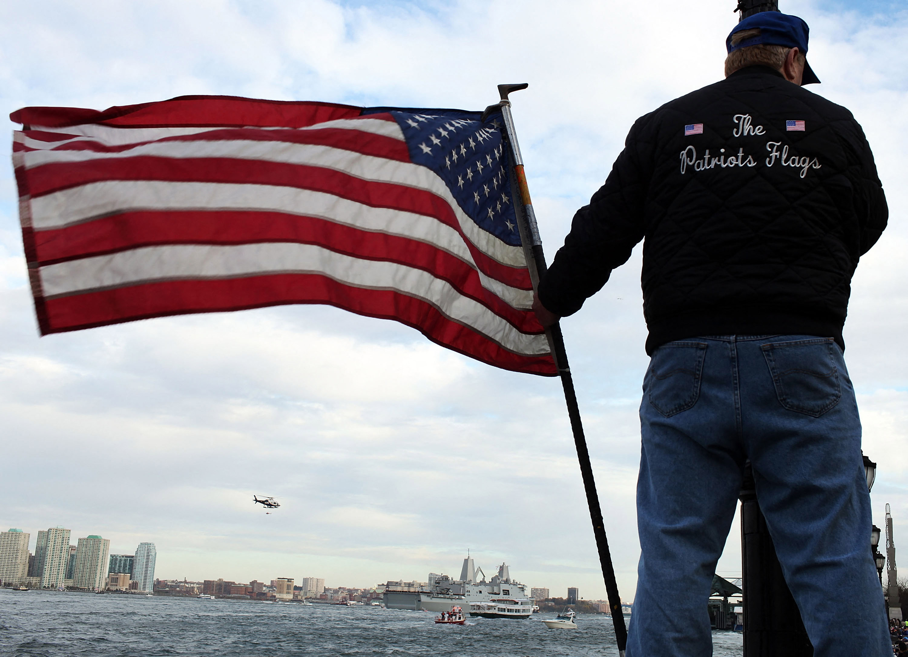 NEW YORK - NOVEMBER 02: Richard Wright holds an American flag