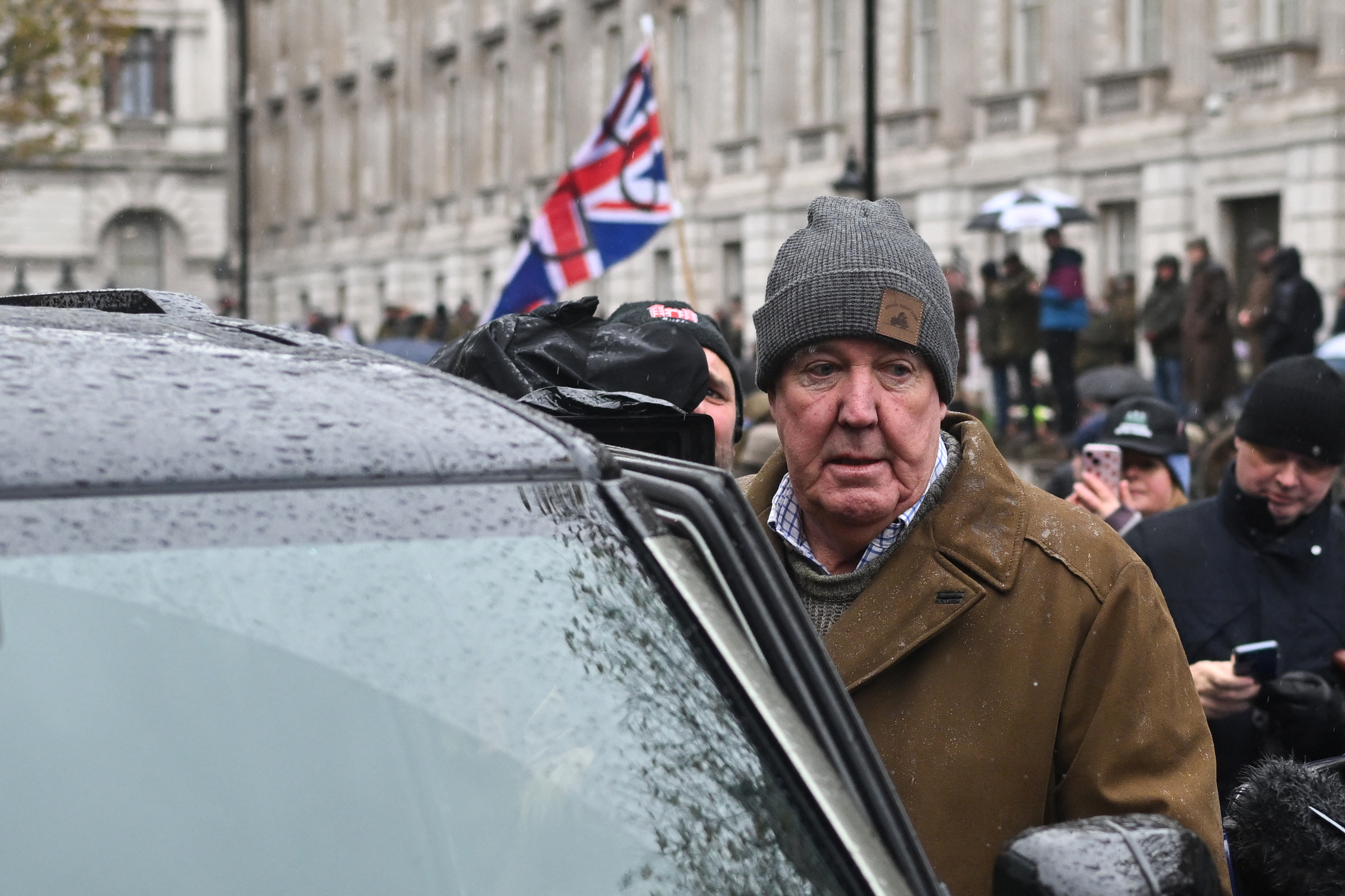 British TV host and farmer Jeremy Clarkson leaves after delivering a speech on stage during a farmers' protest against changes to inheritance tax rules for land ownershi)