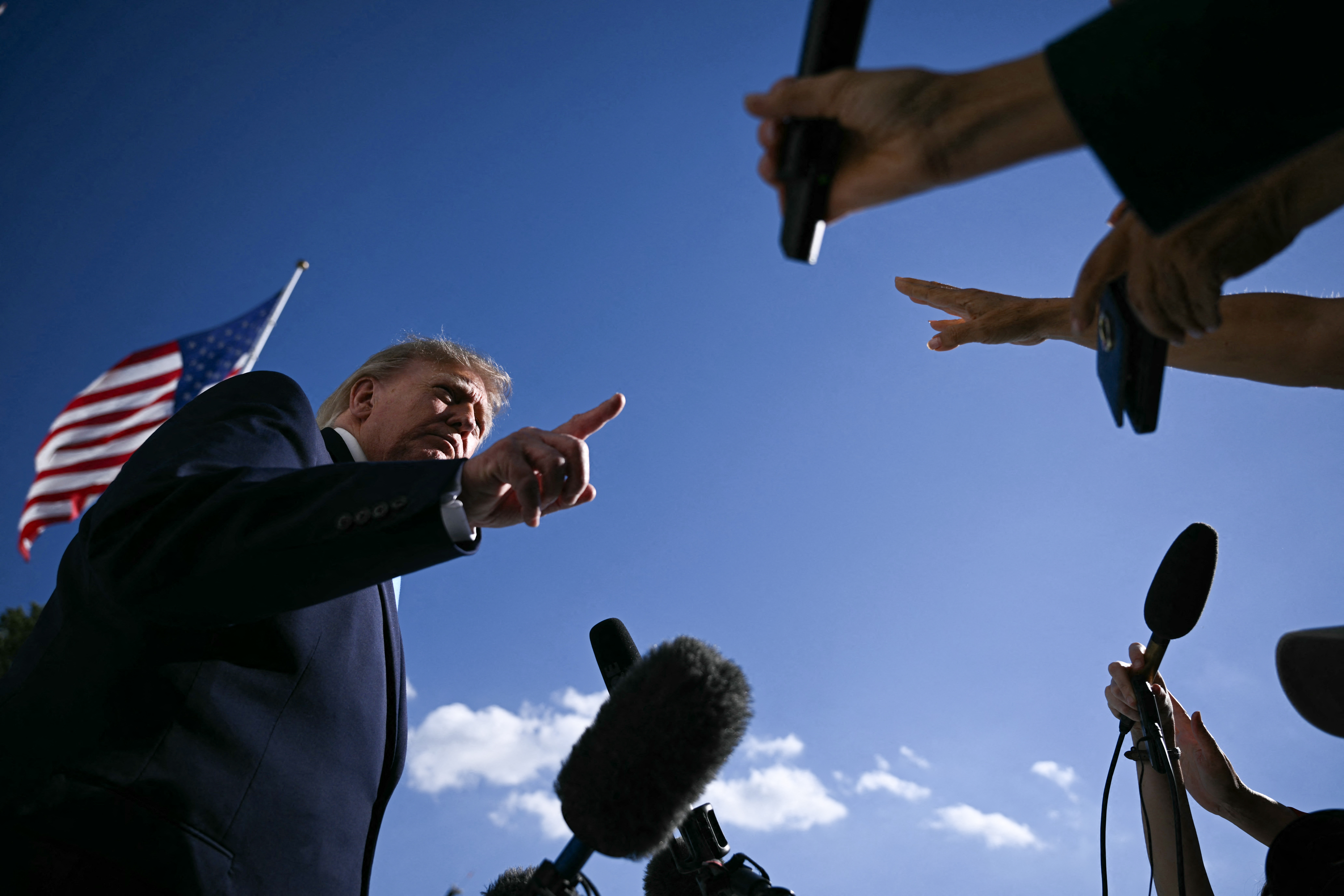 US President Donald Trump speaks to the press. (Photo by Brendan SMIALOWSKI / AFP)
