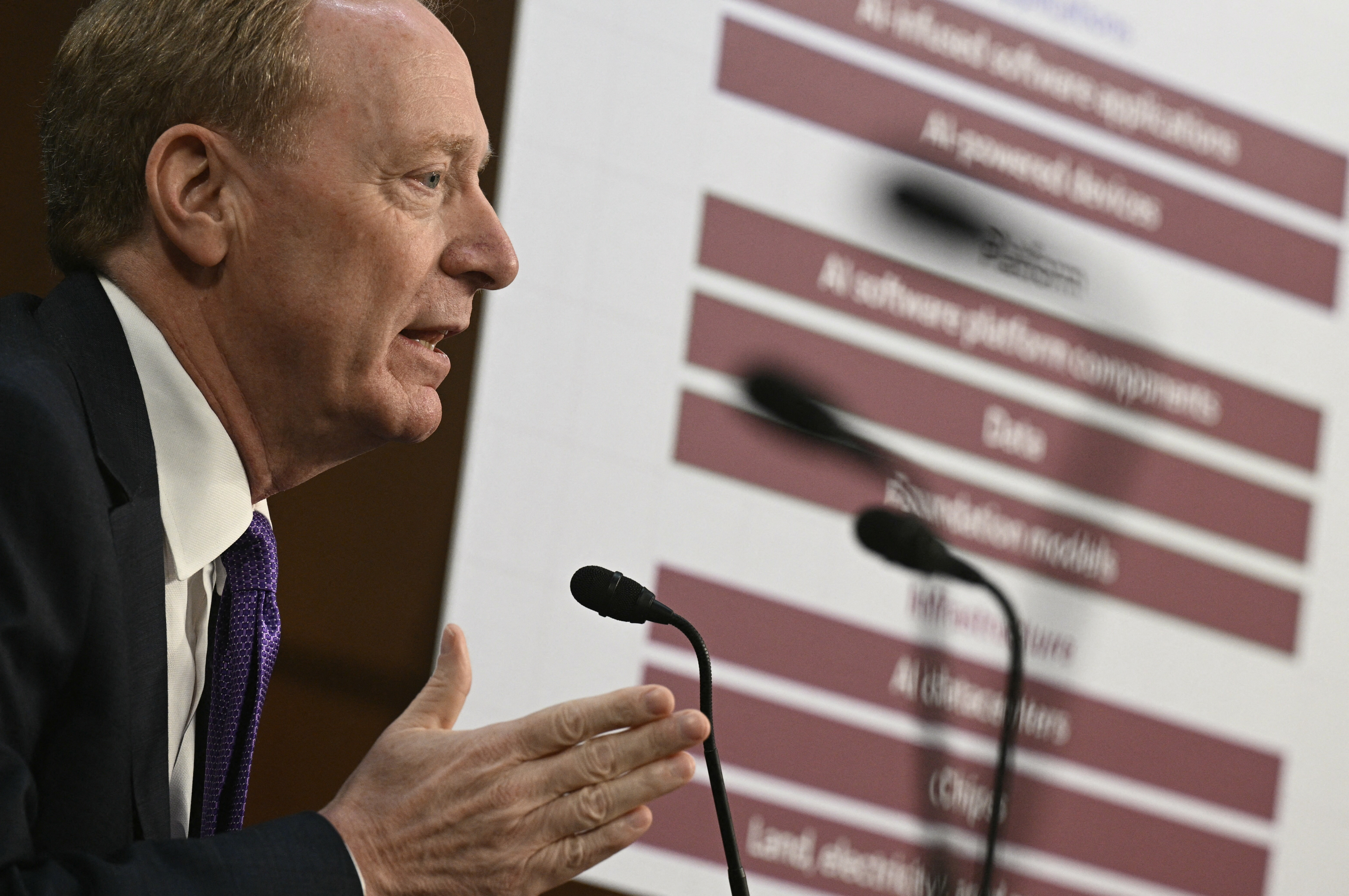 Microsoft Vice-Chair and President Brad Smith speaks during a US Senate Commerce Committee hearing on artificial intelligence (AI) on Capitol Hill in Washington, DC, on May 8, 2025. (Photo by Brendan SMIALOWSKI / AFP)