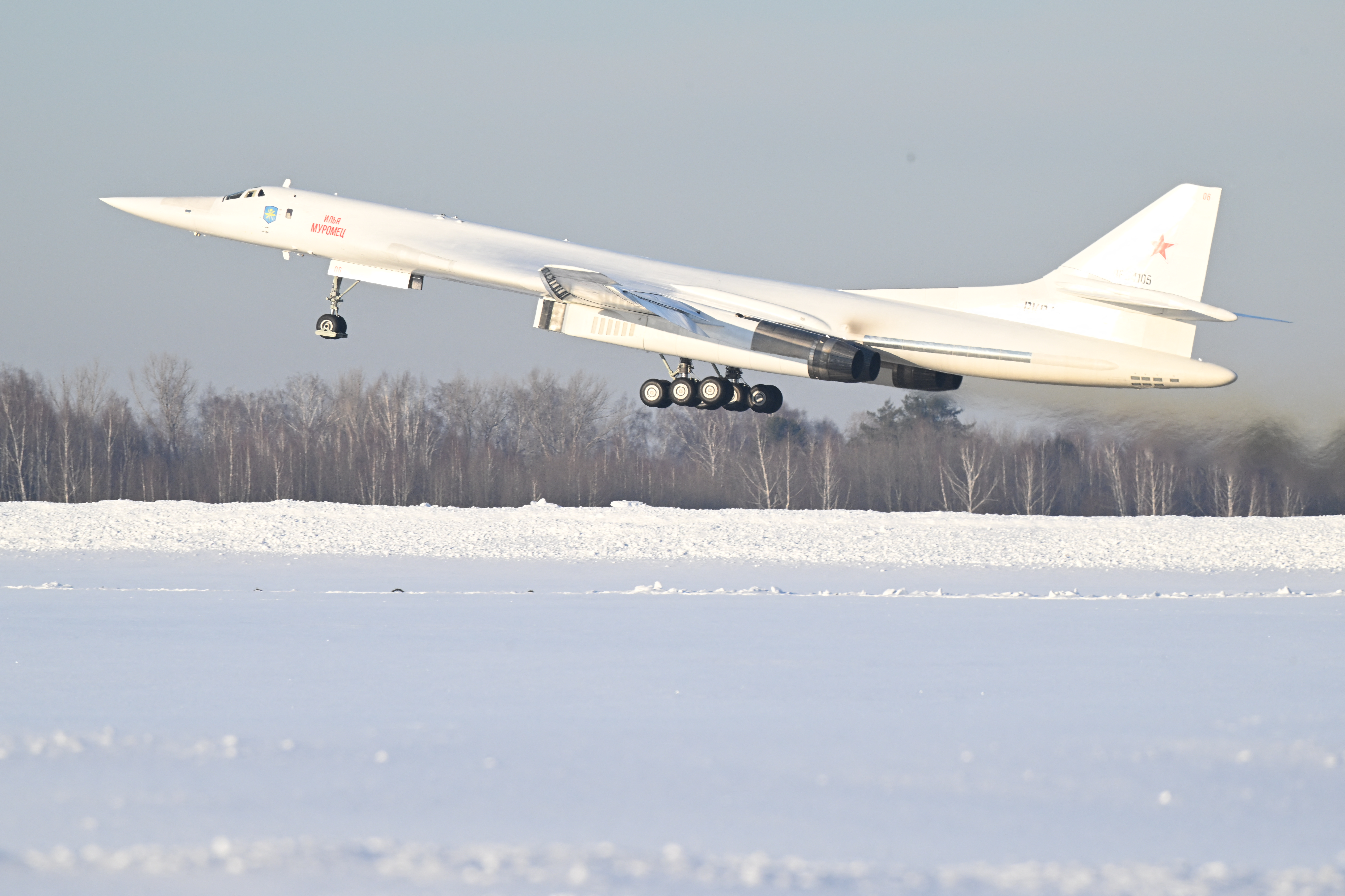 In this pool photograph distributed by Russian state agency Sputnik, the Tupolev Tu-160M "Ilya Muromets" strategic bomber takes off from the runway of an aircraft manufacturer in Kazan on February 22, 2024. (Photo by Dmitry AZAROV / POOL / AFP)