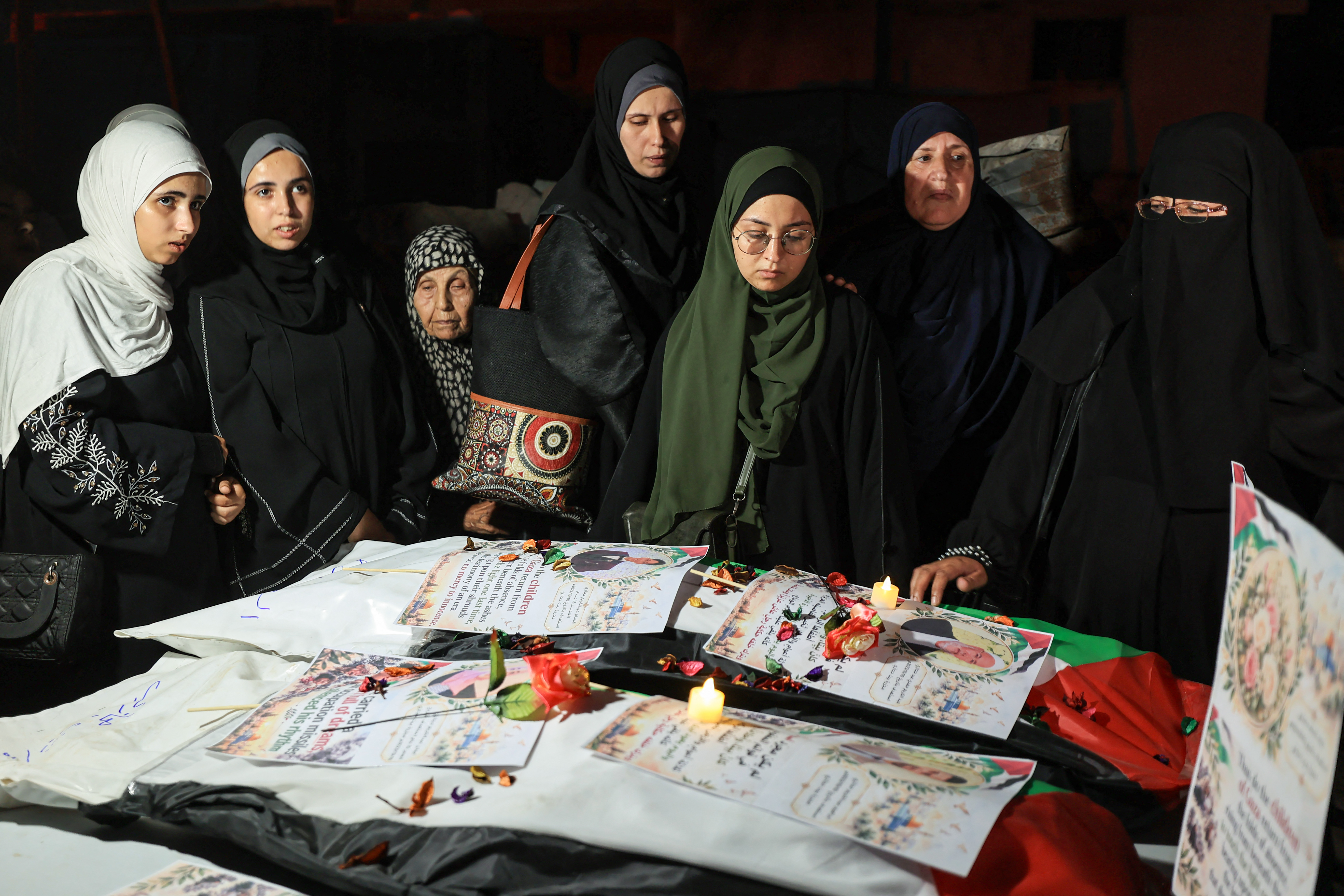 Palestinian mourners gather during a mass funeral procession in al-Daraj neighbourhood in Gaza City on October 17, 2026, following the recovery of the remains of nearly 85 bodies from beneath the rubble of buildings