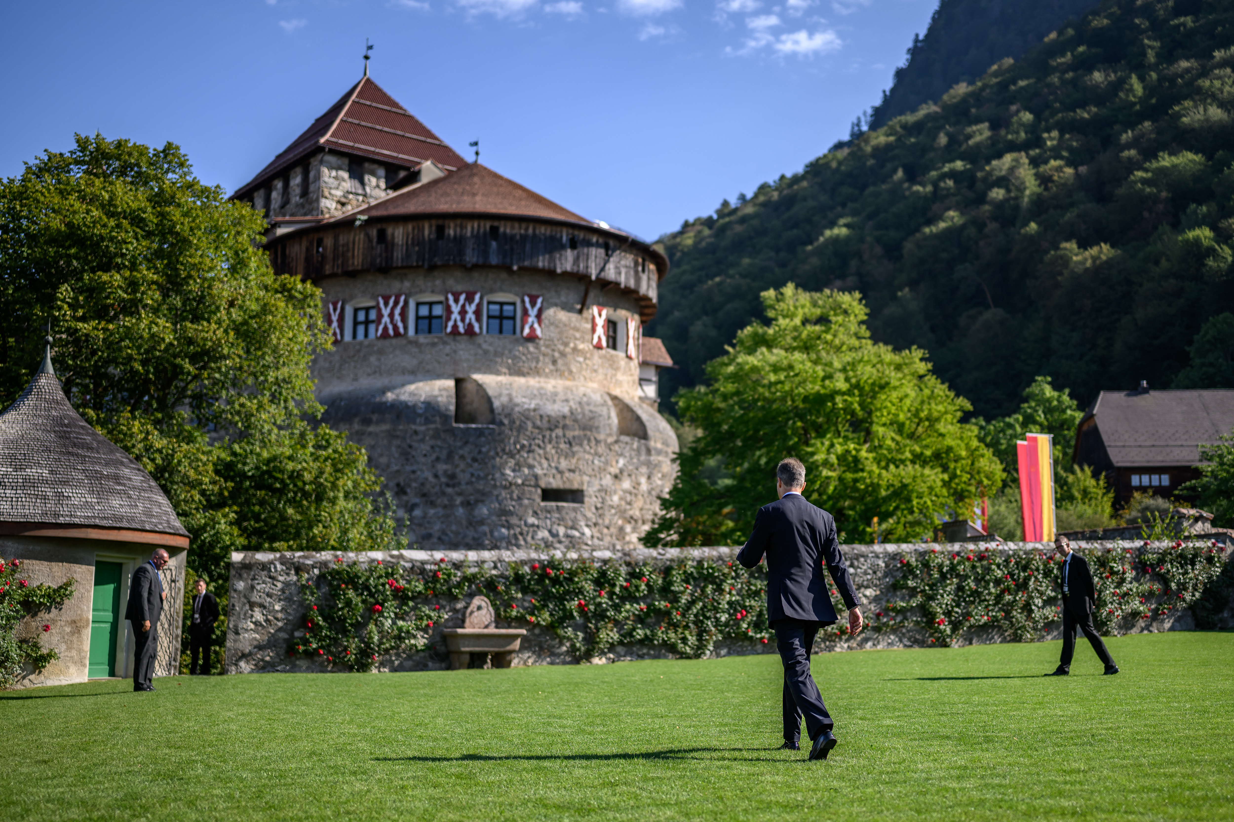 Liechtenstein's Hereditary Prince Alois walks toward Vaduz Castle, the palace and official residence of the princely family, after a press meeting ahead of Liechtenstein's National Day celebrations in Vaduz on August 15, 2026.