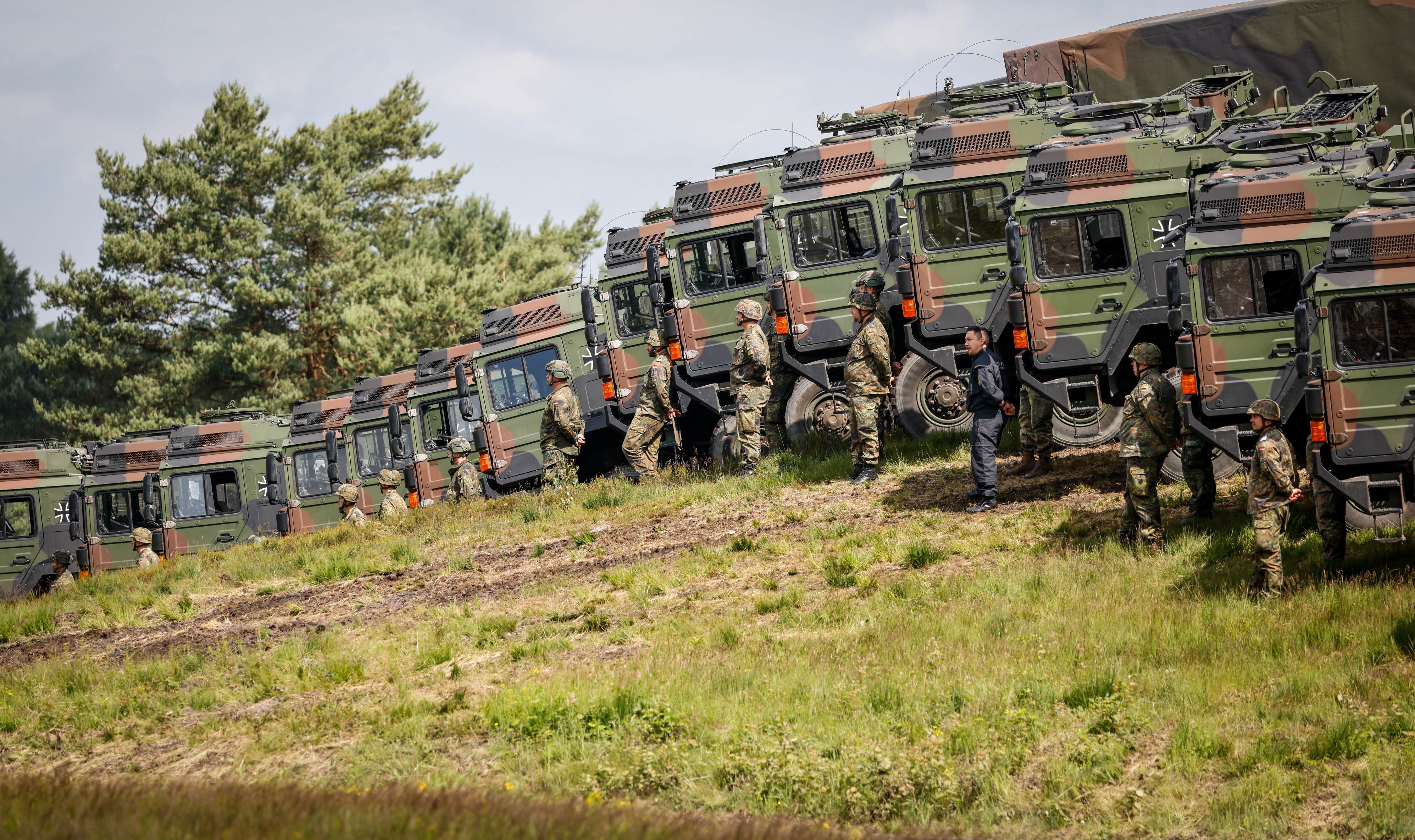 Soldiers of the German army(Photo by FOCKE STRANGMANN / AFP)