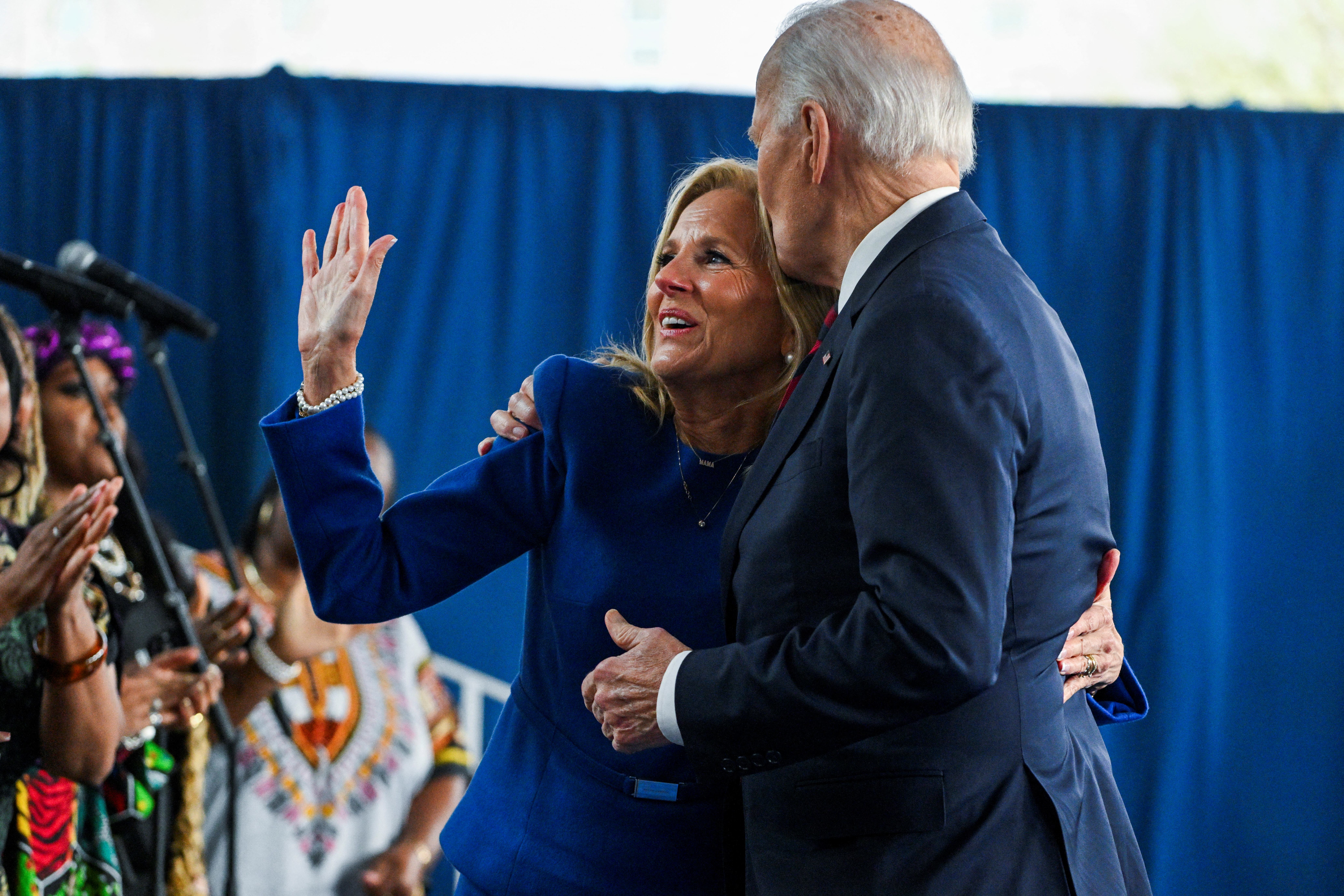 US President Joe Biden kisses the head of US First Lady Jill Biden at the end of their visit to the International African American Museum in Charleston, South Carolina, on January 19, 2025. (Photo by ROBERTO SCHMIDT / AFP)