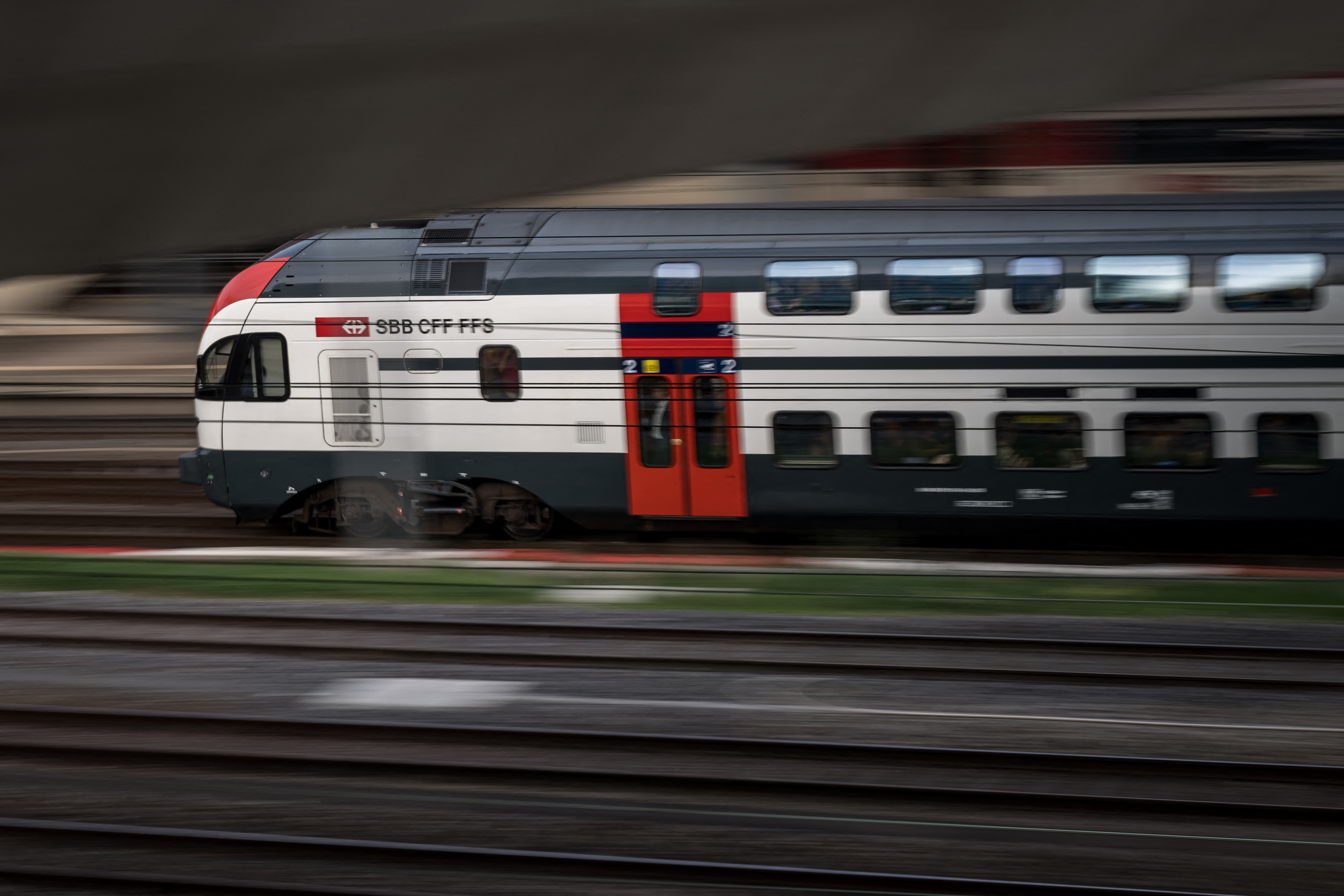 A Swiss Federal Railways (SBB / CFF / FFS) train runs on the tracks in Geneva on October 6, 2023. (Photo by Fabrice COFFRINI / AFP)
