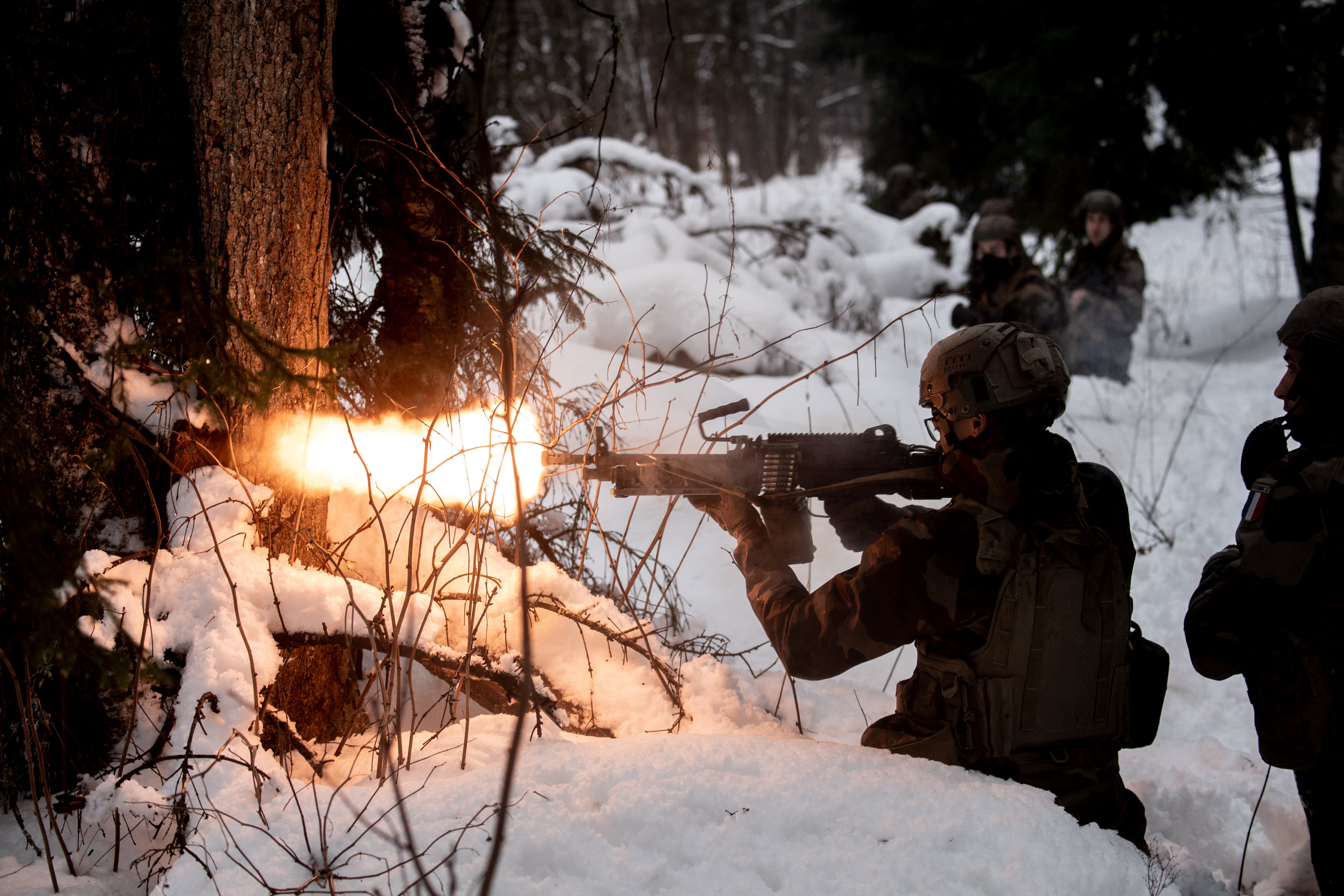 French soldiers take part in a major drill as part of  NATO's EFP (Enhance forward presence) operation at the Tapa Estonian army camp near Rakvere, on February 6, 2022. (Photo by ALAIN JOCARD / AFP)