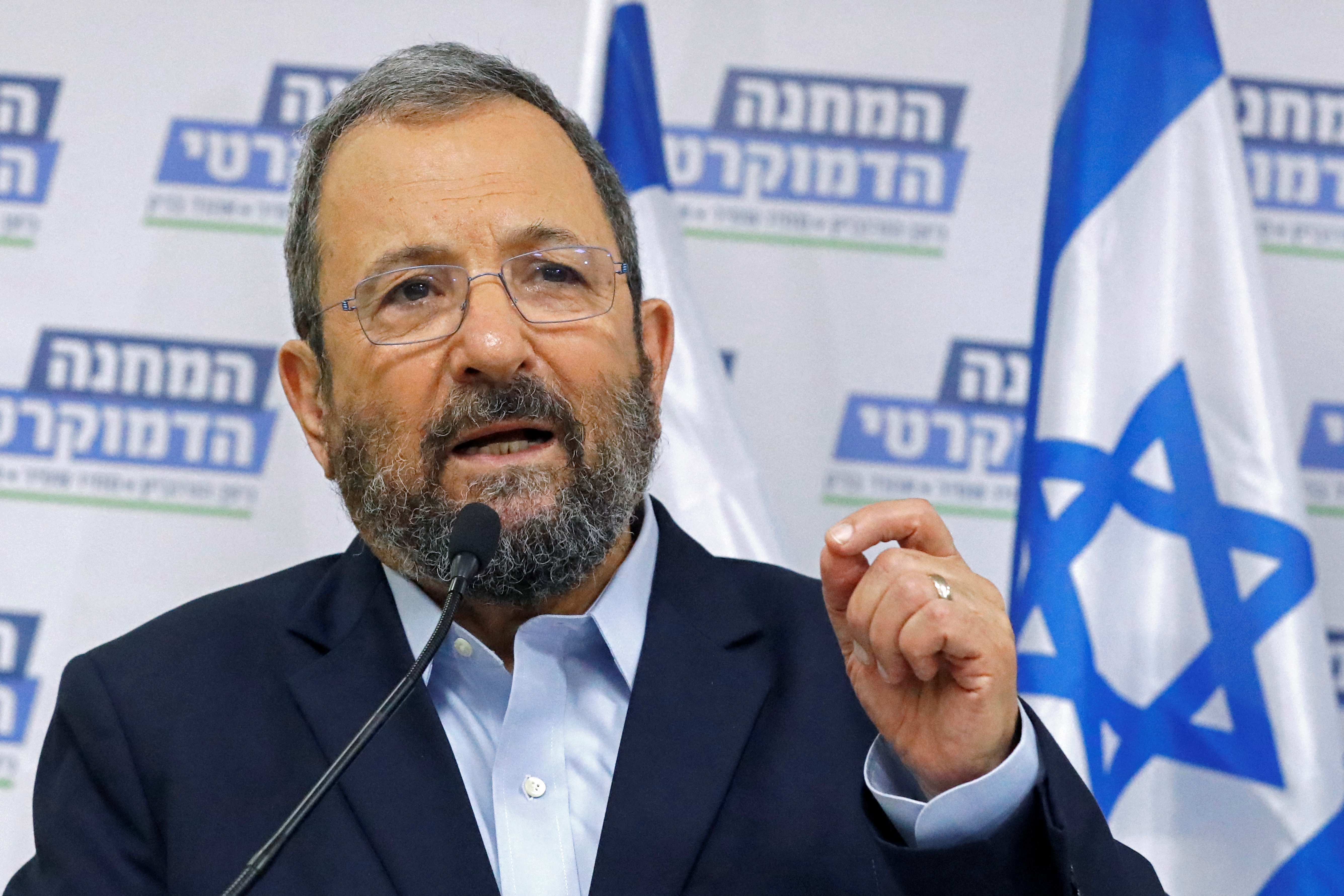 Former Israeli Prime Minister Ehud Barak (L) attends the launch of the Democratic Union list on July 25, 2019 in the Israeli coastal city of Tel Aviv.
