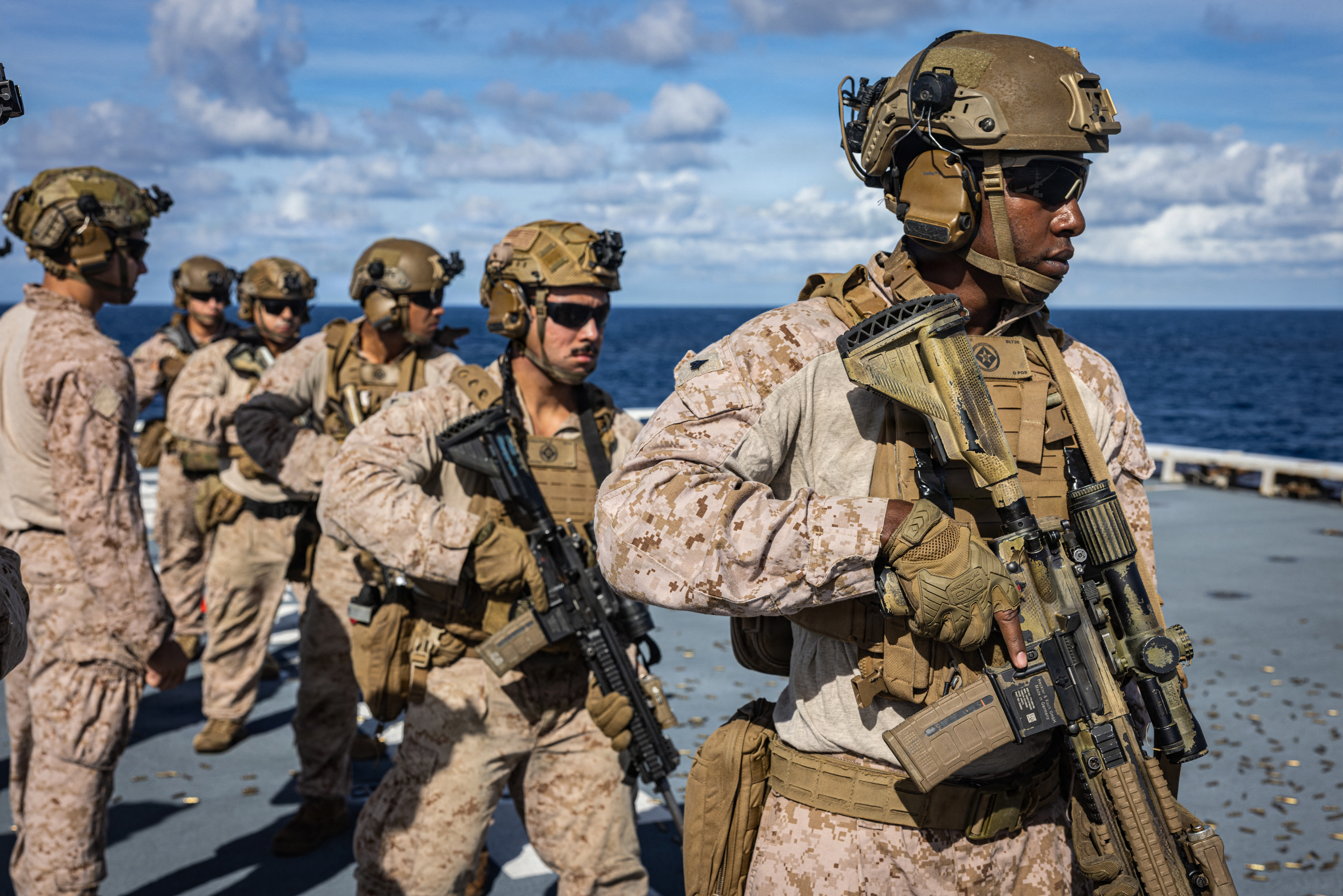 This handout photo from the US Marine Corps taken on November 25, 2025 and released on December 2, 2025, shows Marines with India Company, Battalion Landing Team 3/6, 22nd Marine Expeditionary Unit