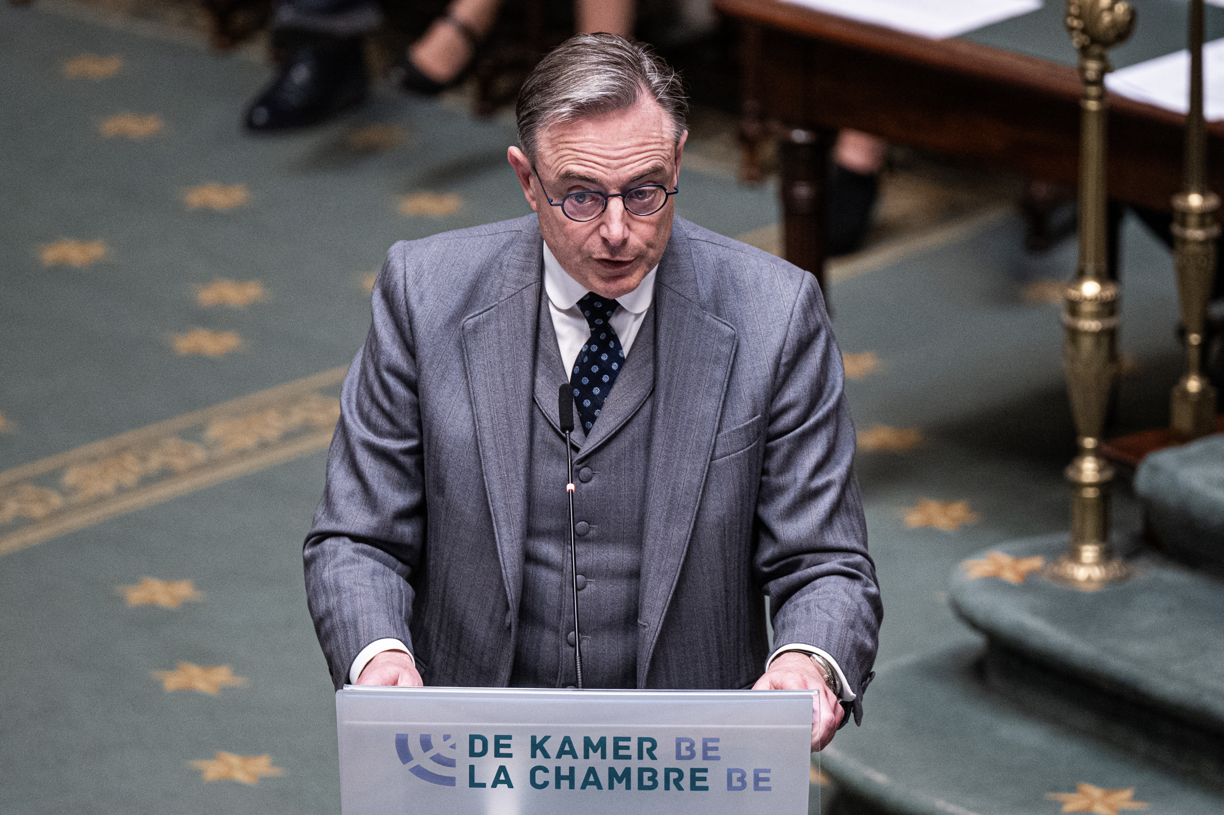 Belgium's Prime Minister Bart De Wever speaks during a plenary session of the Chamber at the Federal Parliament in Brussels on March 12, 2026. (Photo by