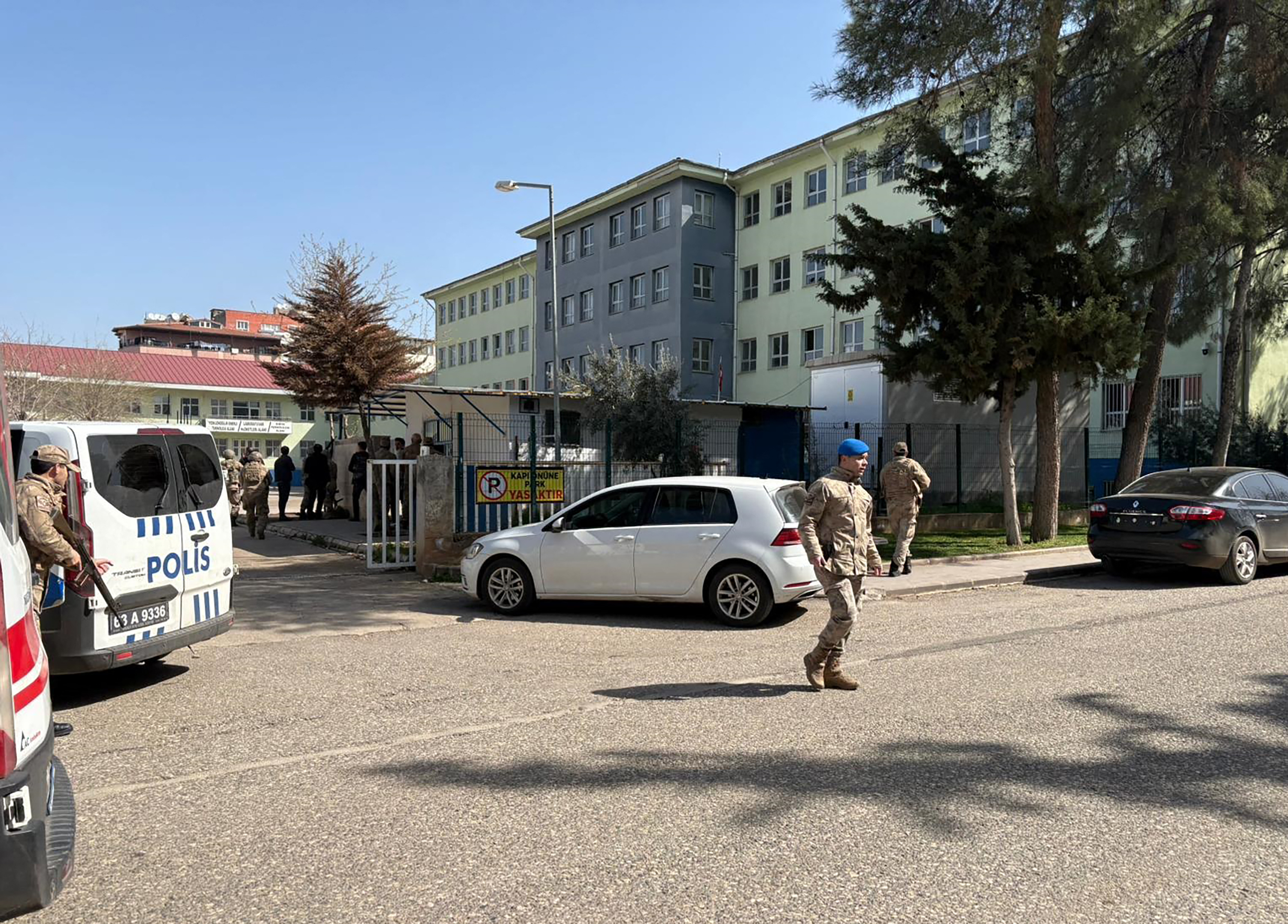pecial force security surrounding a school in southeastern Turkey(Photo by Handout / DHA (Demiroren News Agency) / AFP) / Turkey OUT / RESTRICTED TO EDITORIAL USE - MANDATORY CREDIT "AFP PHOTO /  DHA (Demiroren News Agency) "