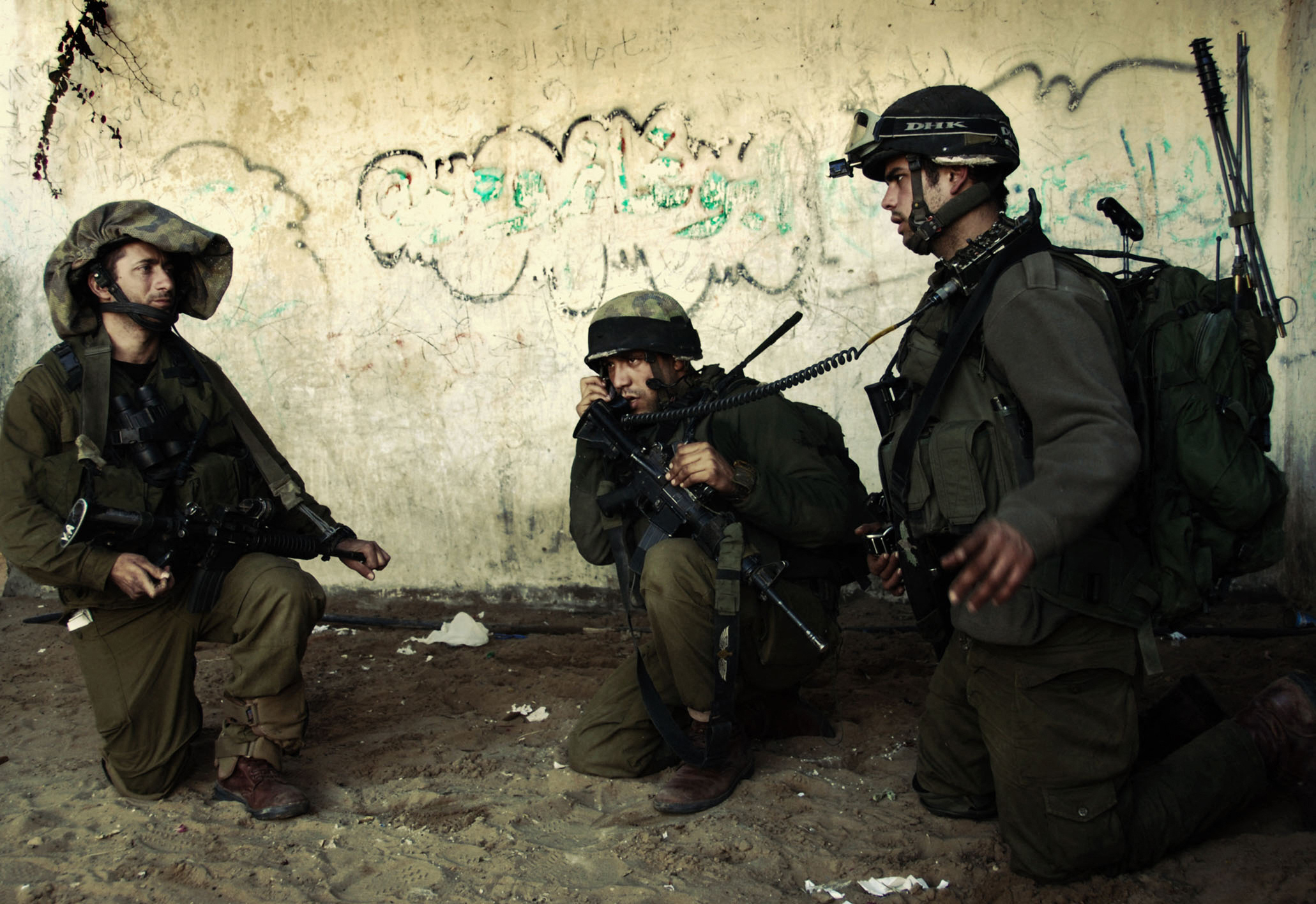 In this handout picture released by the Israeli Army (IDF) Israeli soldiers patrol an undisclosed location inside the Gaza Strip on January 7, 2009.