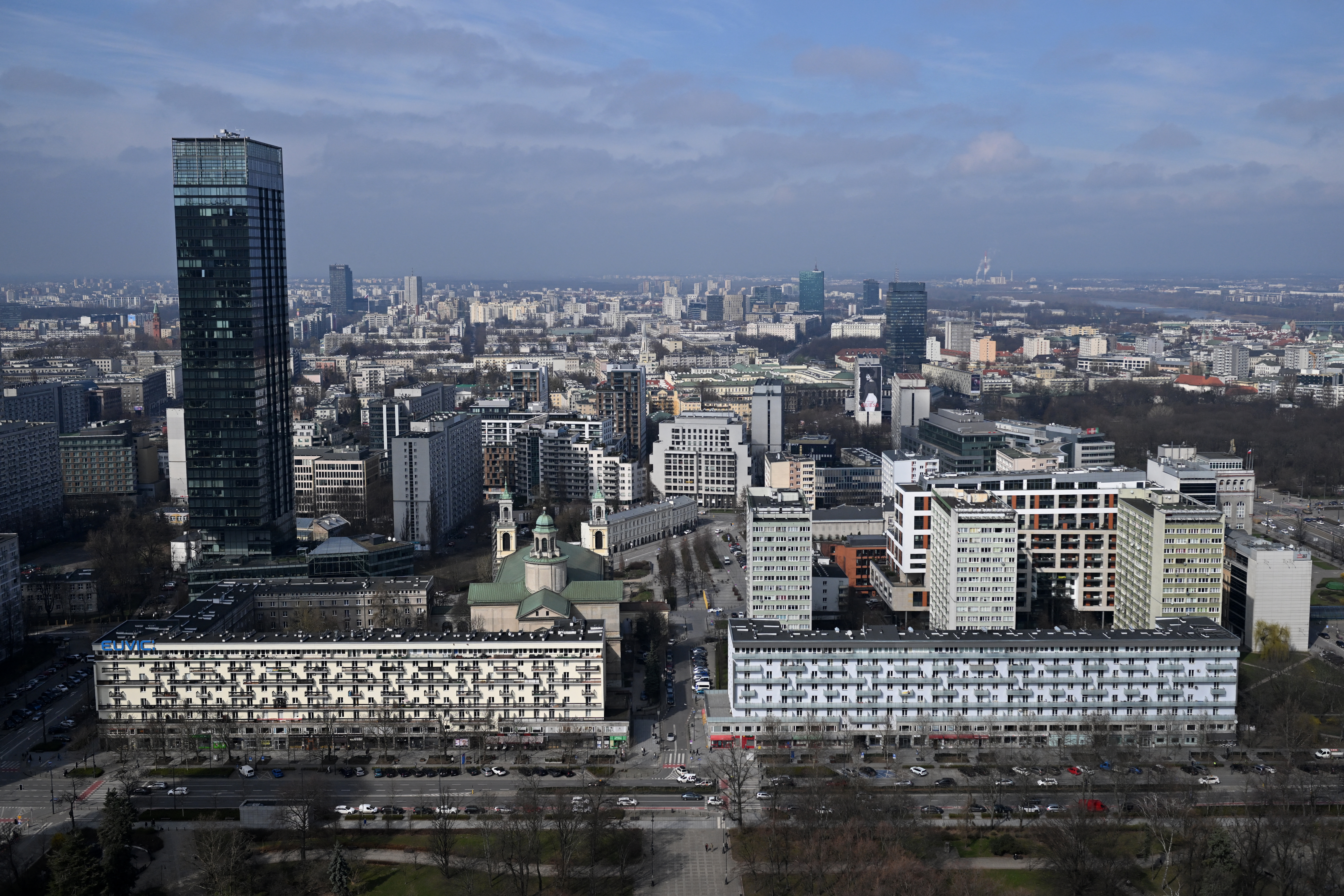 This photograph taken on March 20, 2024 shows a panoramic view of Warsaw as seen from the Palace of Culture and Science. (Photo by Sergei GAPON / AFP)