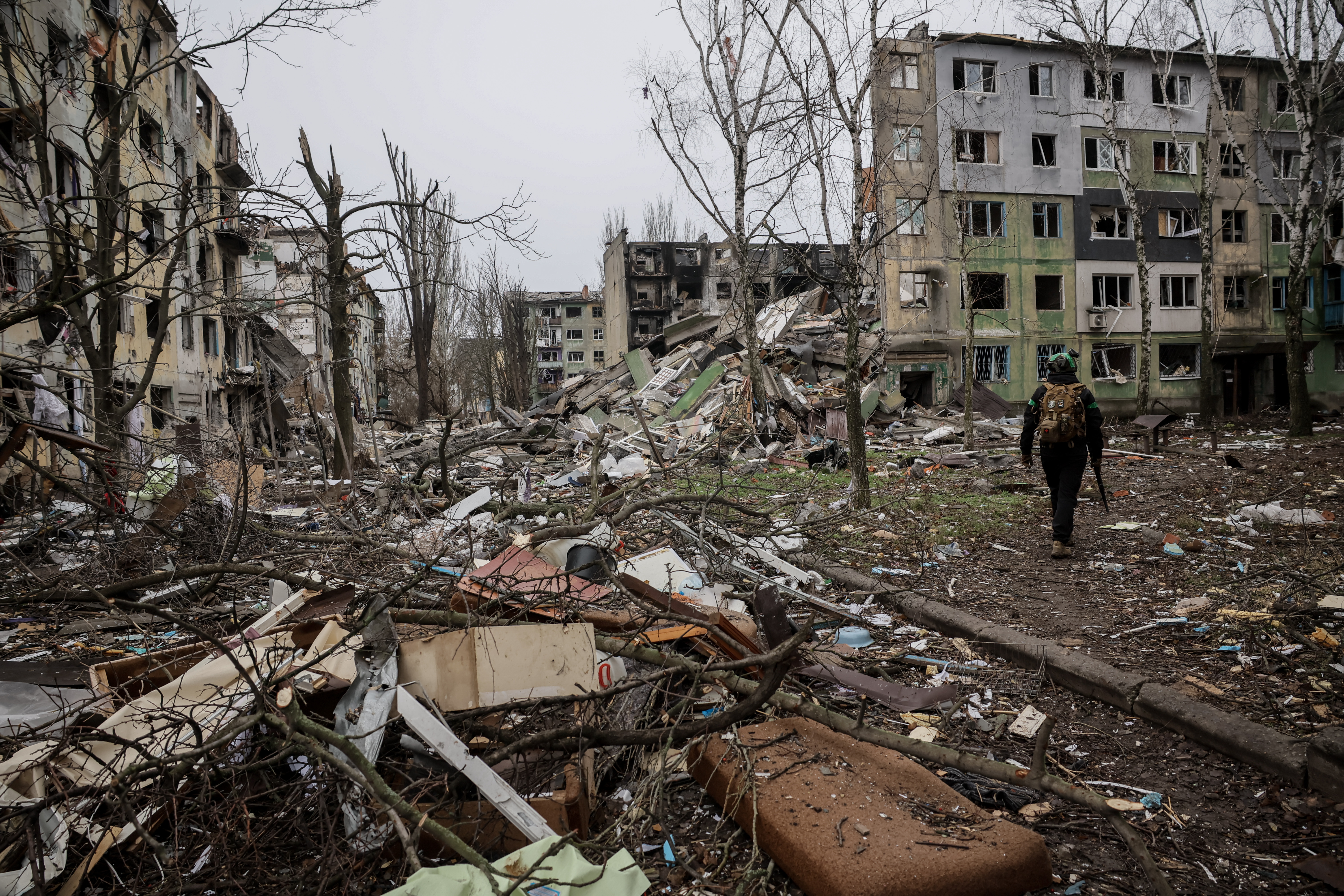 A soldier walks through the ruins of the town of Kostyantynivka. (Oleg Petrasiuk/Ukraine's 24th Mechanized Brigade via AP)