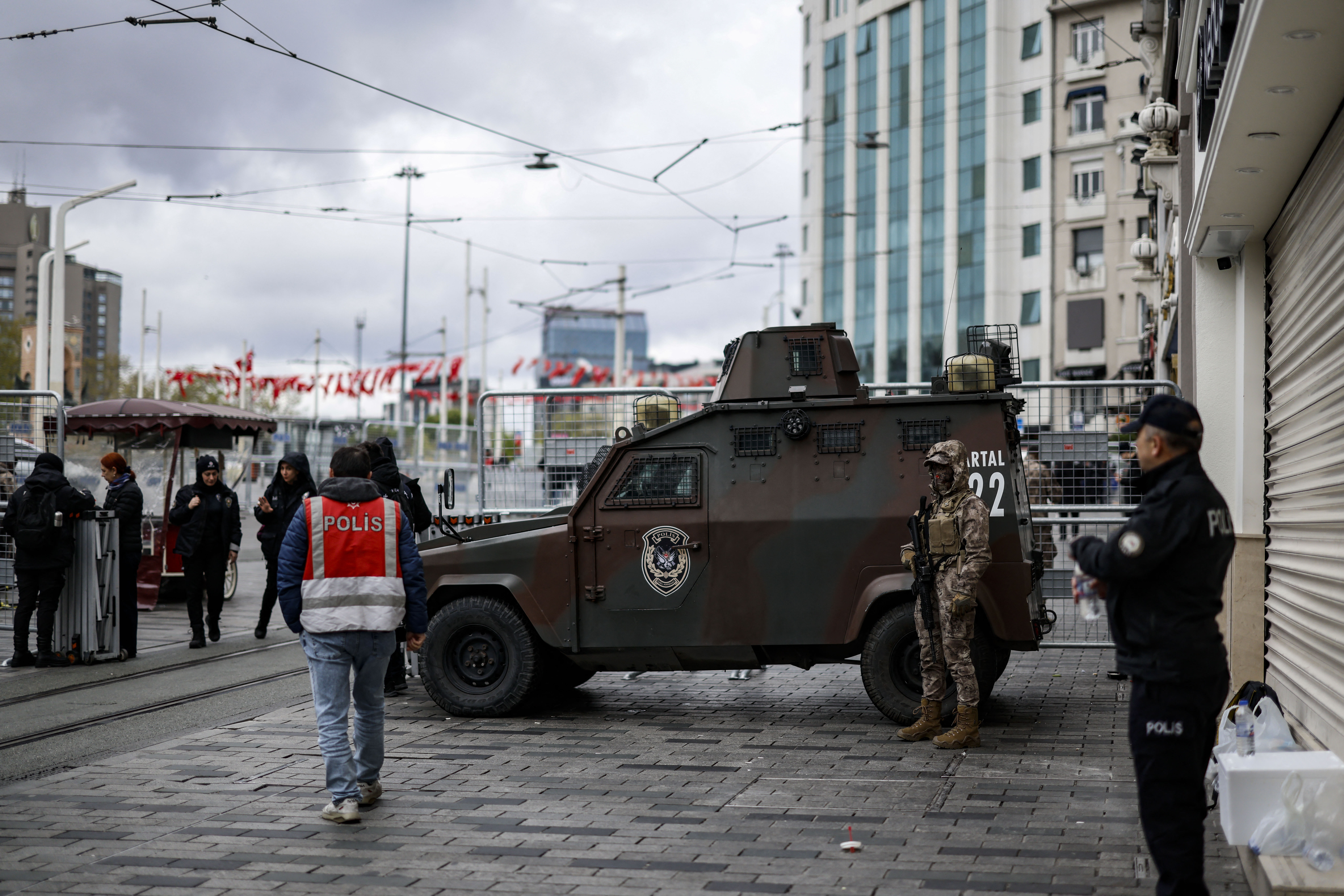 Police officers block access to Taksim Square using barriers during a May Day (Labour Day), marking International Workers' Day, in the Taksim district of Istanbul, on May 1, 2026.