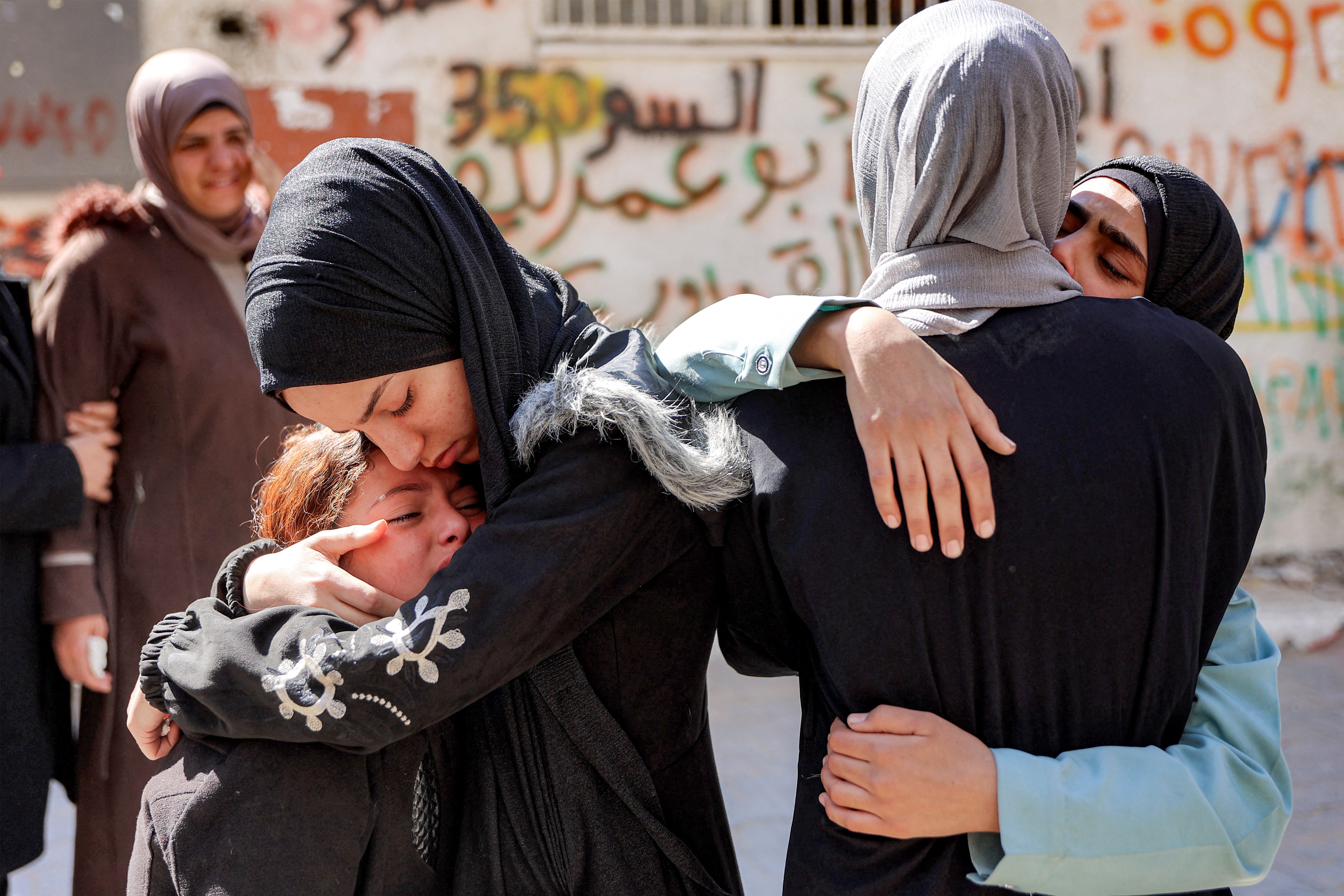 Mourners grieve the victims killed by Israeli bombardment the previous day during the funeral at Shifa Hospital in Gaza City on May 7, 2026