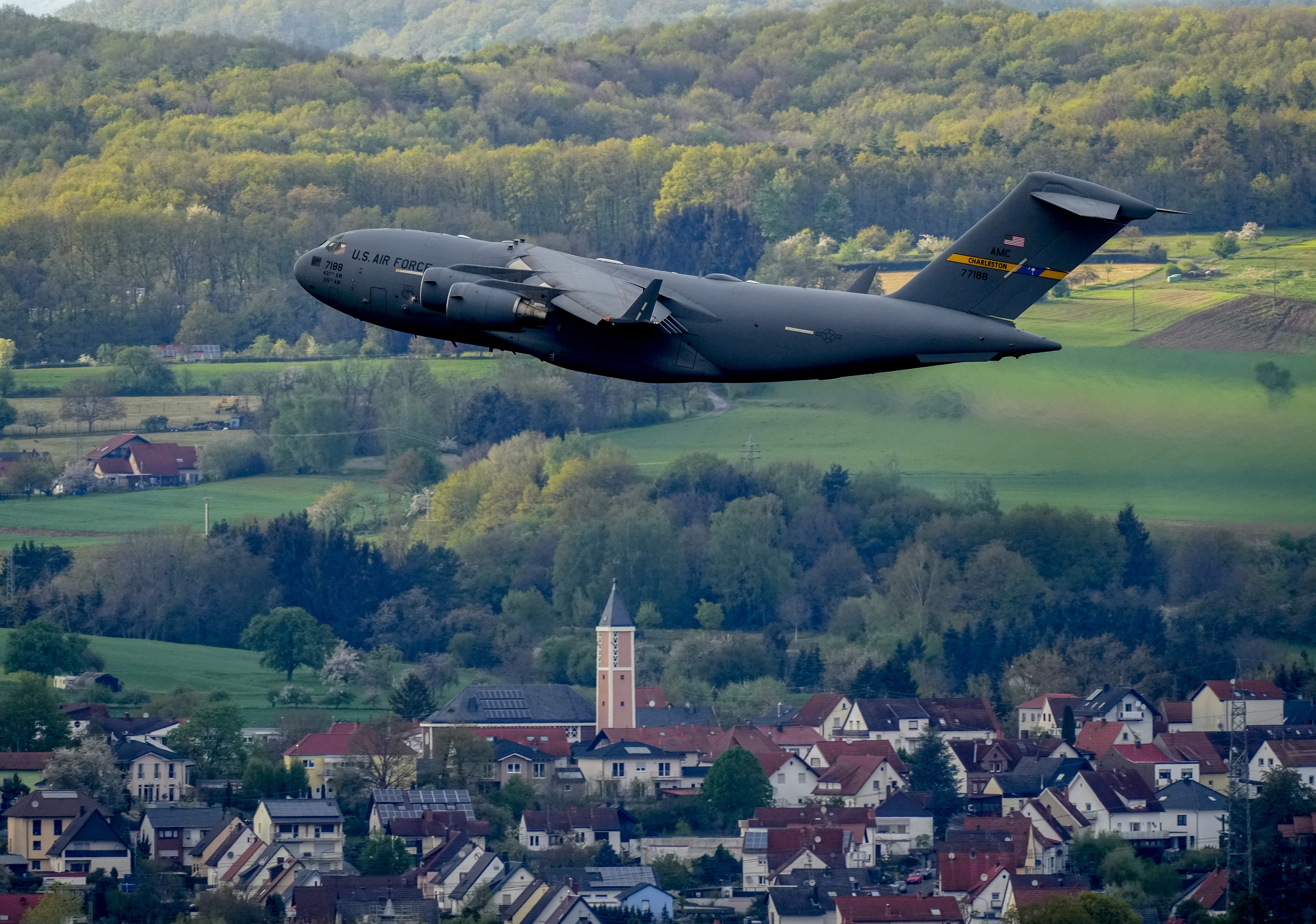 A C-17 Globemaster military aircraft takes off from Ramstein military airbase. (AP Photo/Michael Probst)