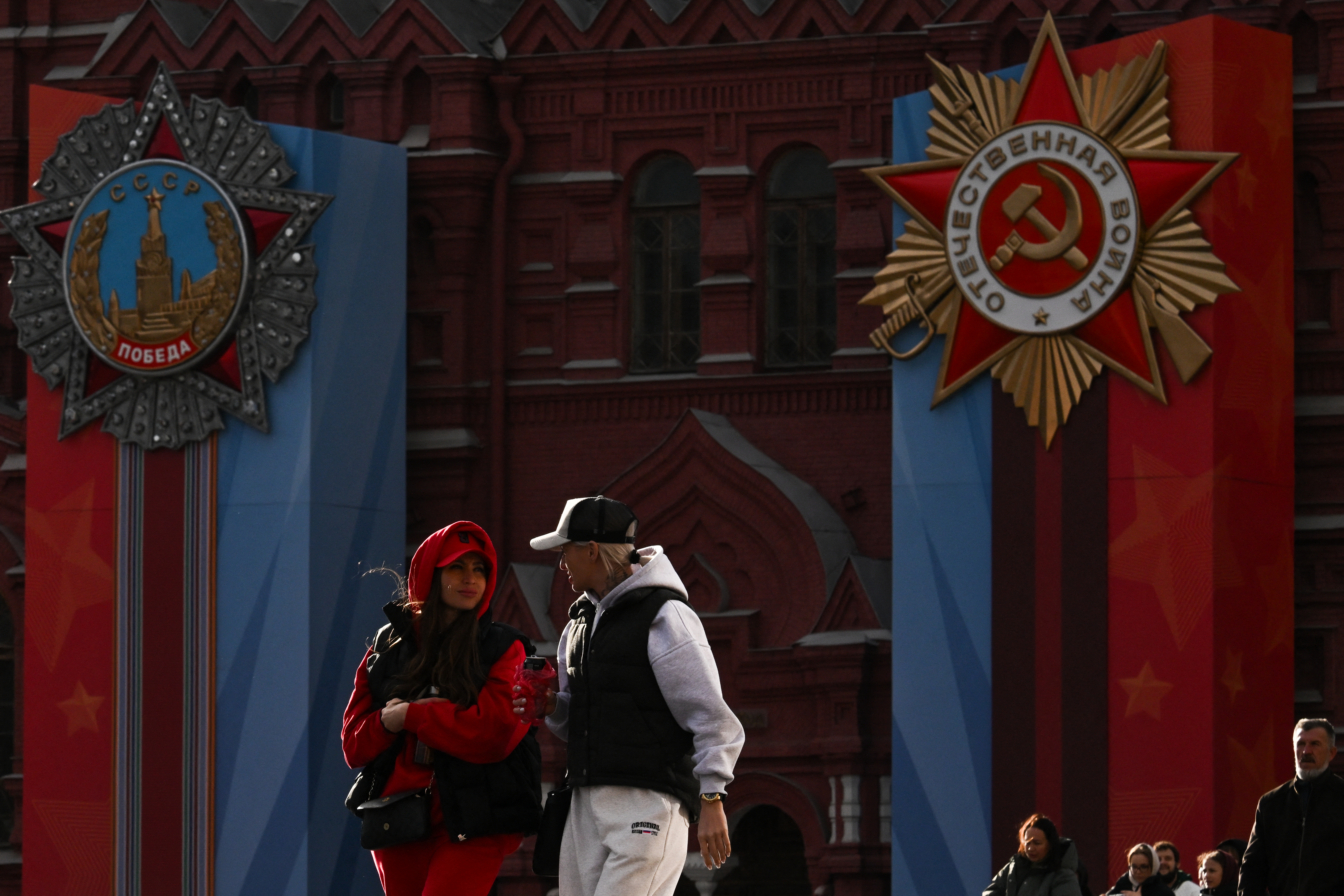 Tourists visit Red Square adorned with first Victory Day decorations in central Moscow on April 24, 2026.