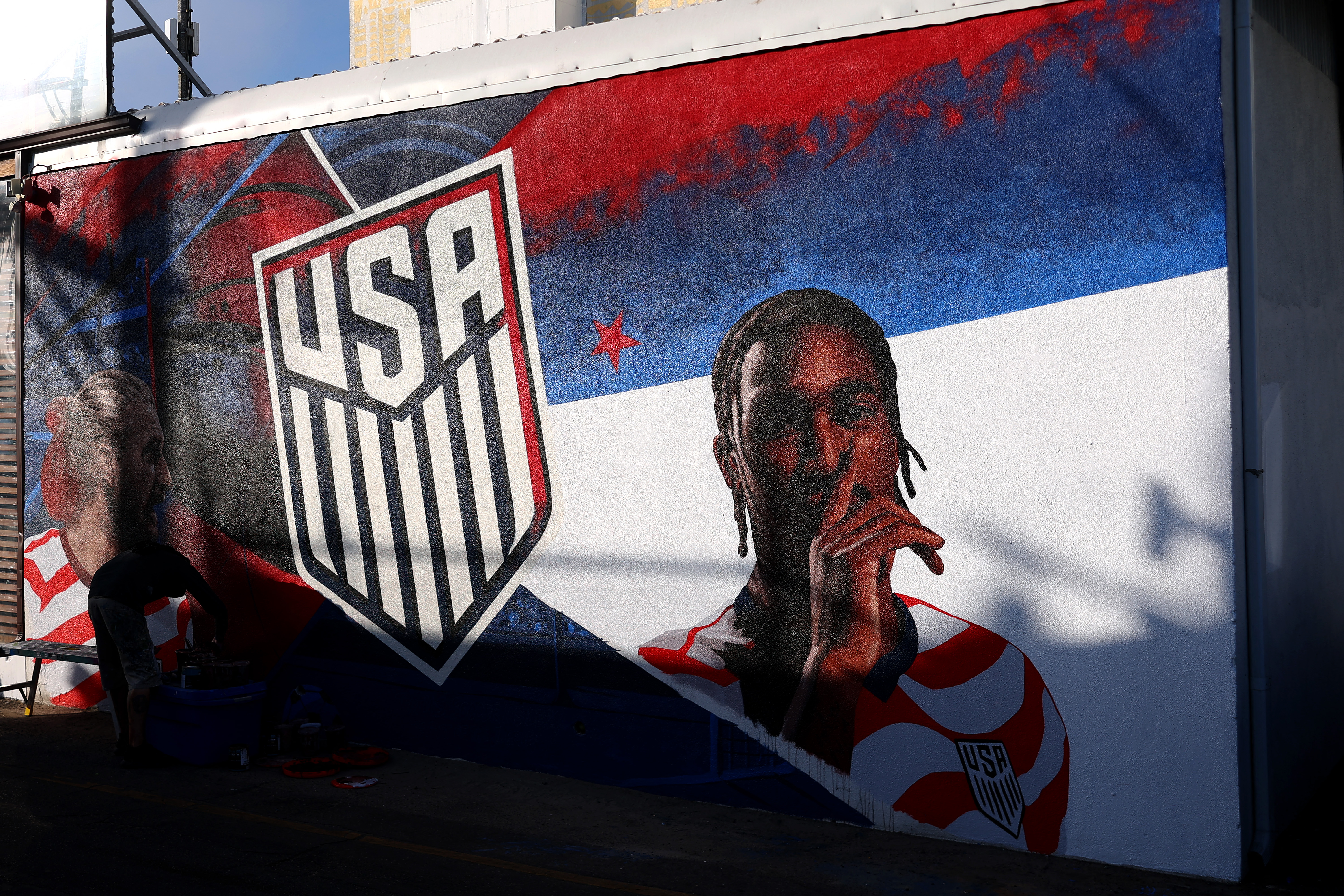 VARIOUS CITIES - JUNE 10: A general view of wall mural with the Team USA or United States men's national soccer team logo and players Haji Wright and Tim Ream painted prior to The FIFA World Cup 2026