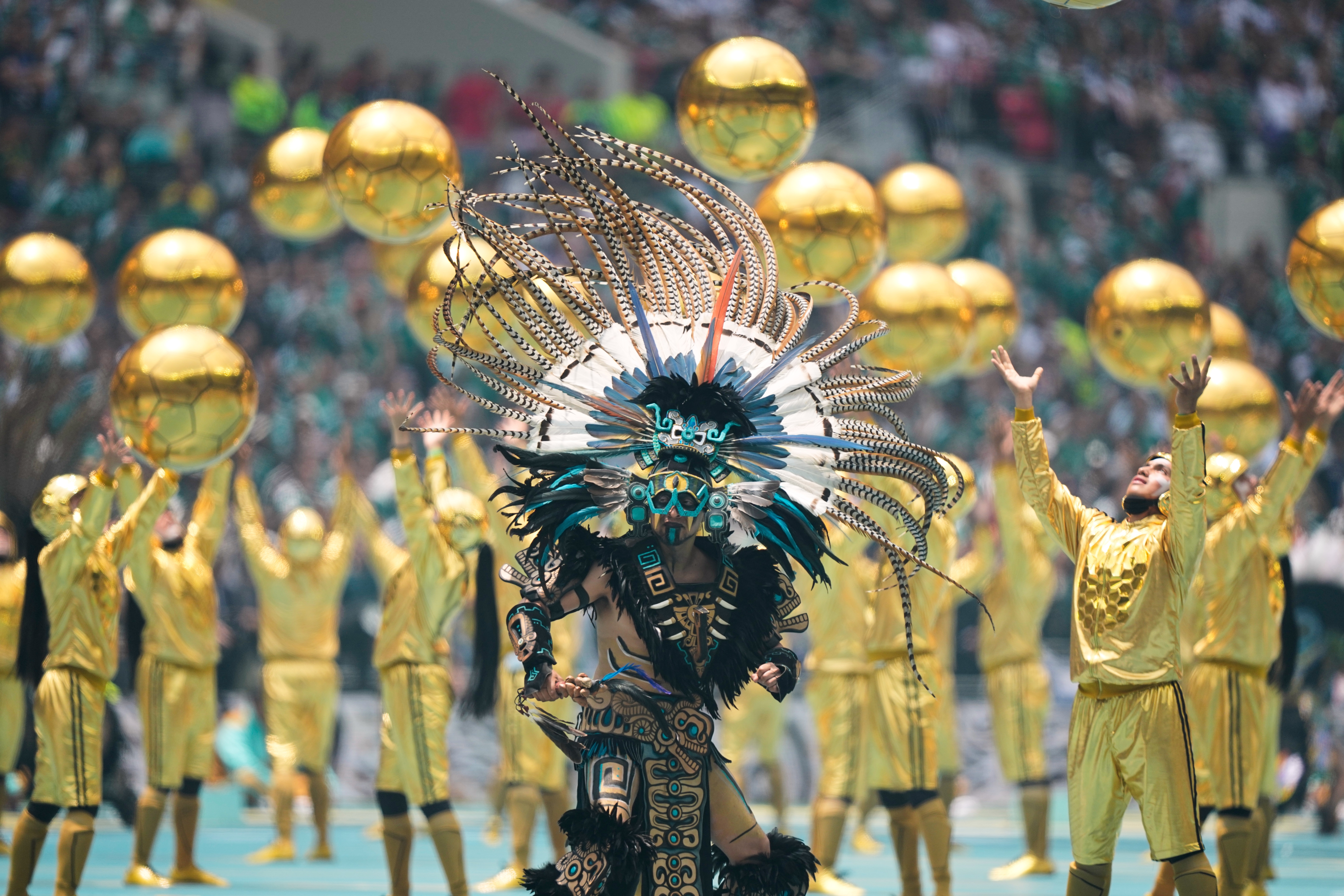 Performers on the pitch during the opening ceremony before the start of the World Cup Group A soccer match between Mexico and South Africa in Mexico City, Thursday, June 11, 2026. (AP Photo/Natacha Pisarenko)