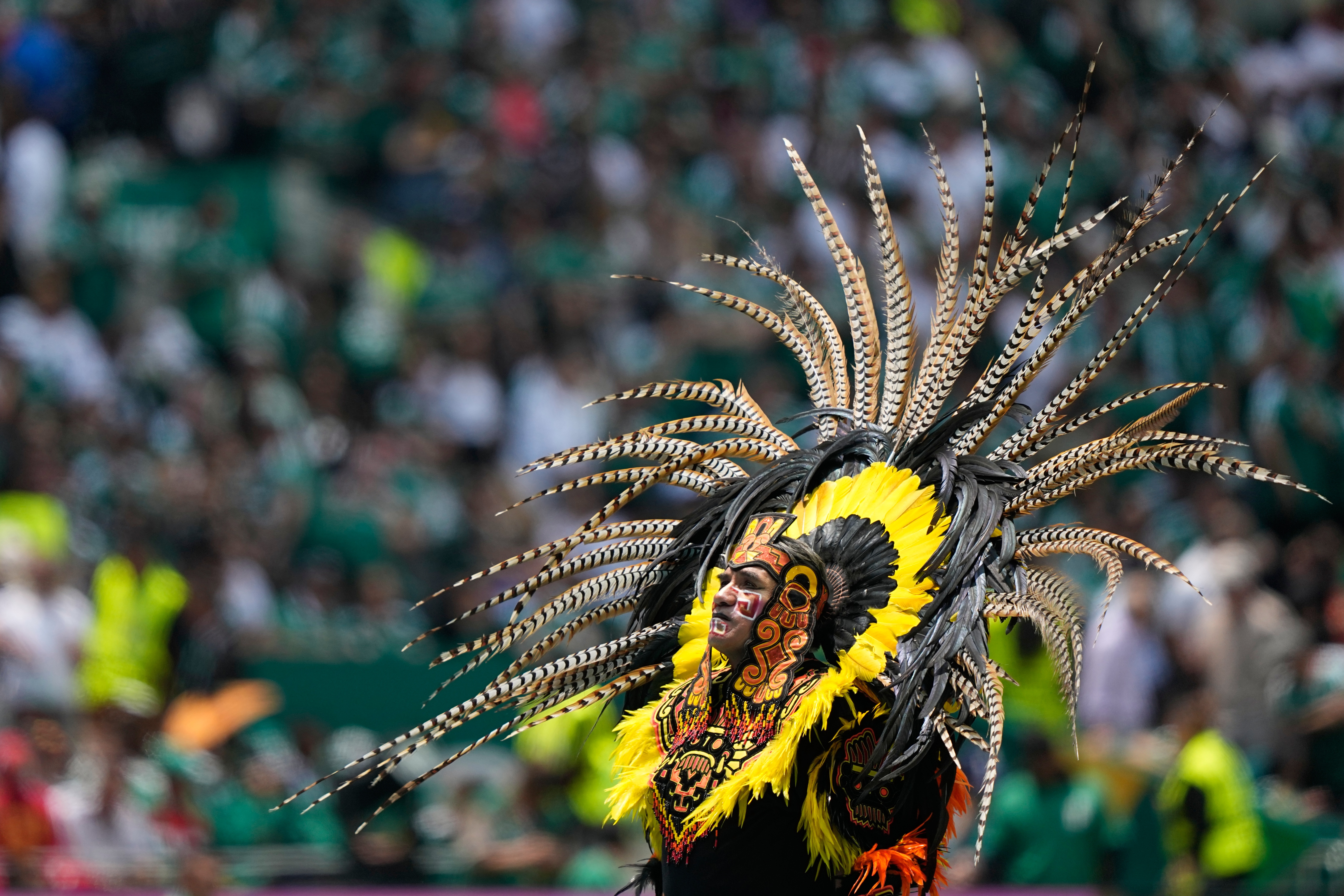 Performers on the pitch during the opening ceremony before the start of the World Cup Group A soccer match between Mexico and South Africa in Mexico City, Thursday, June 11, 2026. (AP Photo/Natacha Pisarenko)