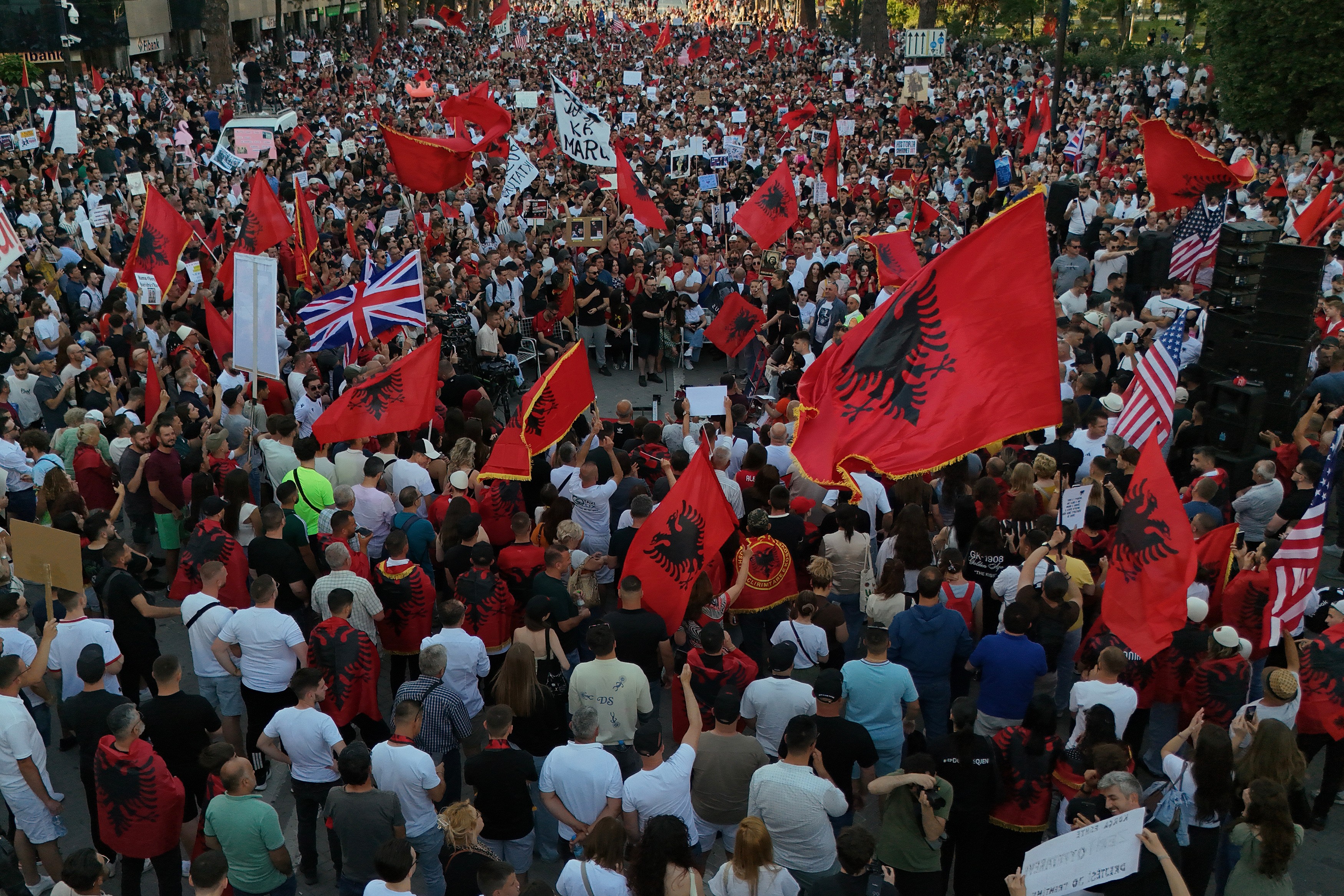 Protesters take part in a rally in Tirana. (AP Photo/Hameraldi Agolli)