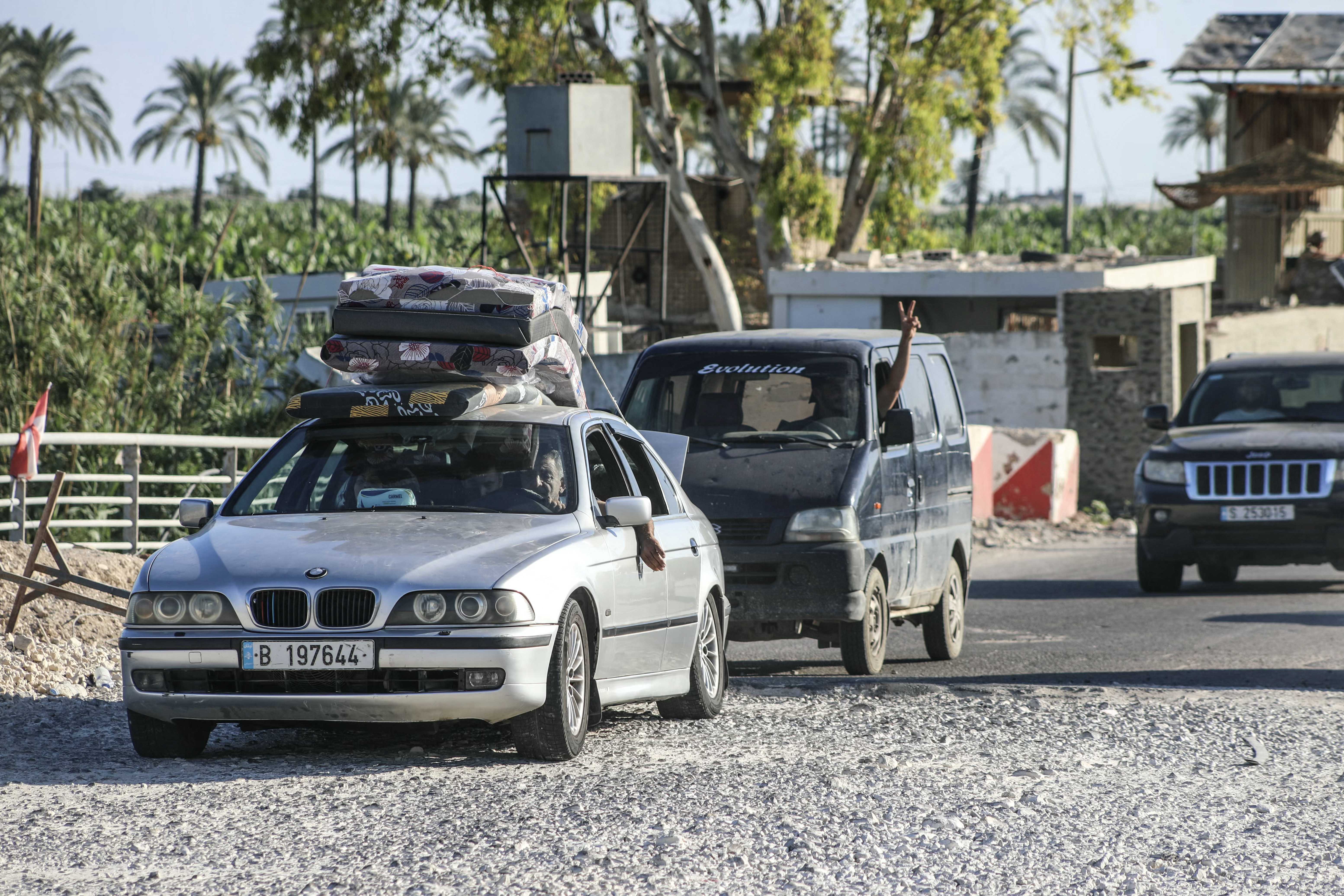 Displaced residents cross the al-Khardali bridge on their way to their villages in southern Lebanon on June 15, 2026.