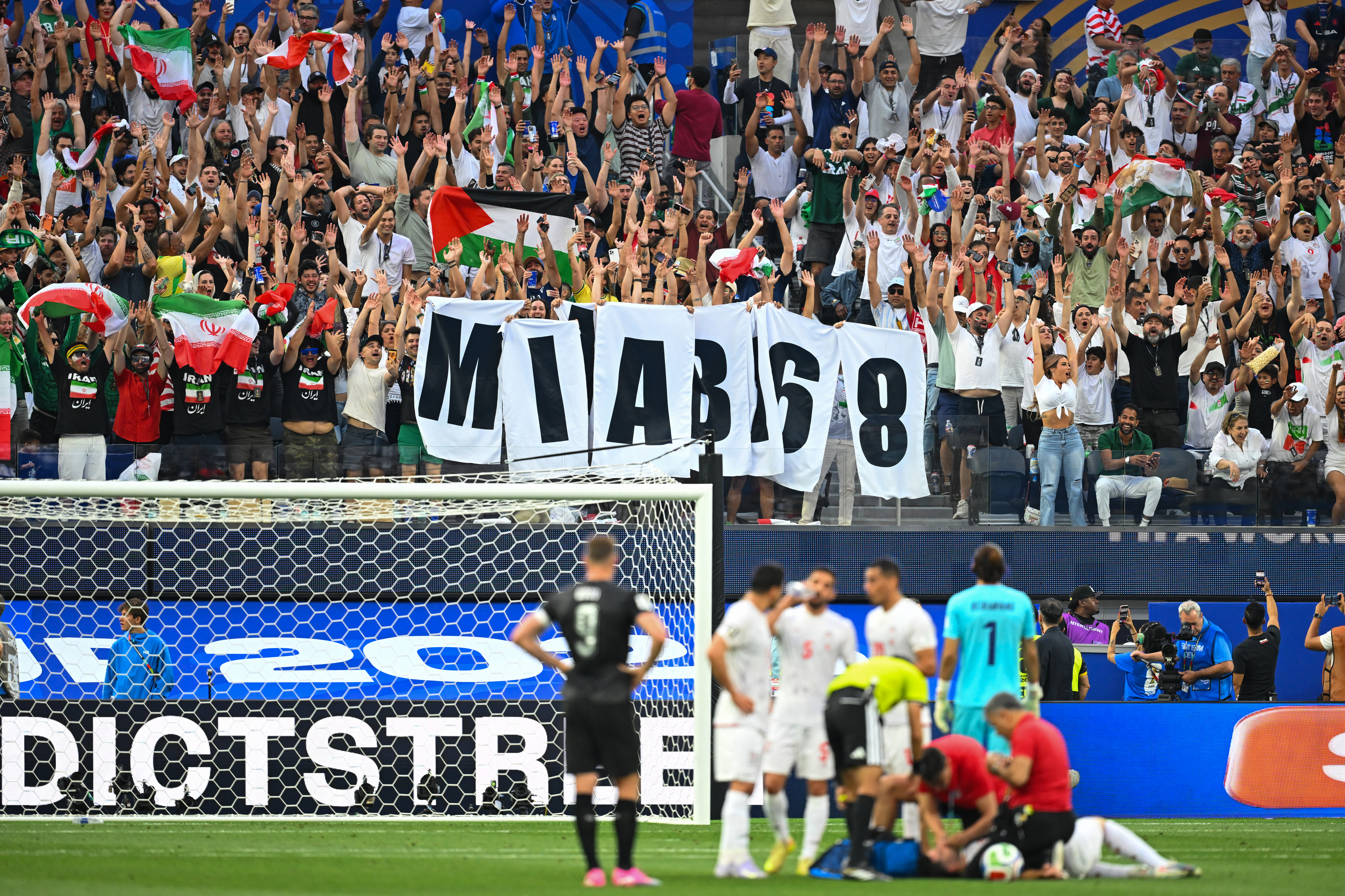 Iranian fans cheer for their team during the 2026 World Cup Group G football match between Iran and New Zealand at Los Angeles Stadium in Inglewood on June 15, 2026.