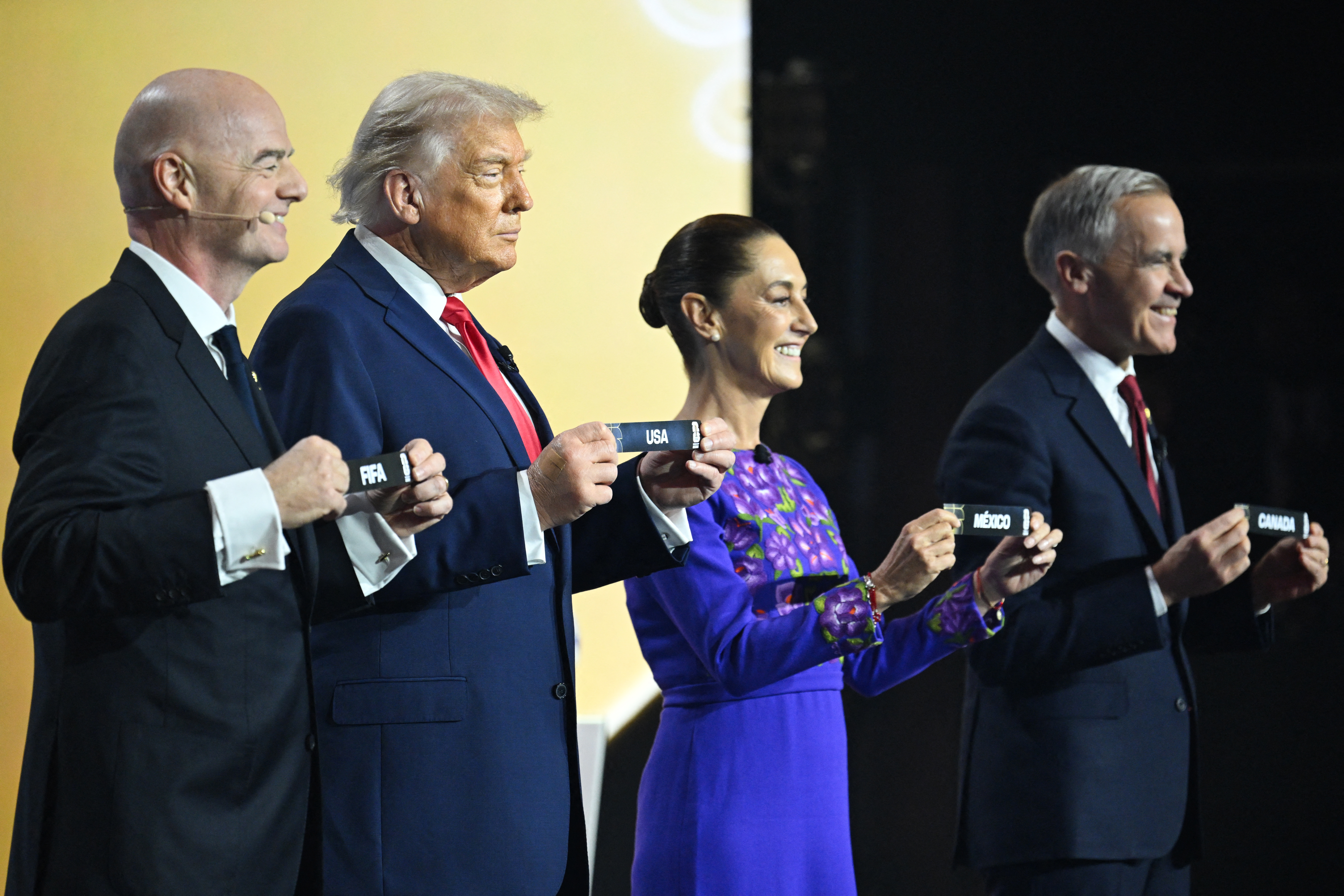 FIFA President Gianni Infantino, US President Donald Trump, Mexico's President Claudia Sheinbaum and Canada's Prime Minister Mark Carney. (Photo by SAUL LOEB / AFP)