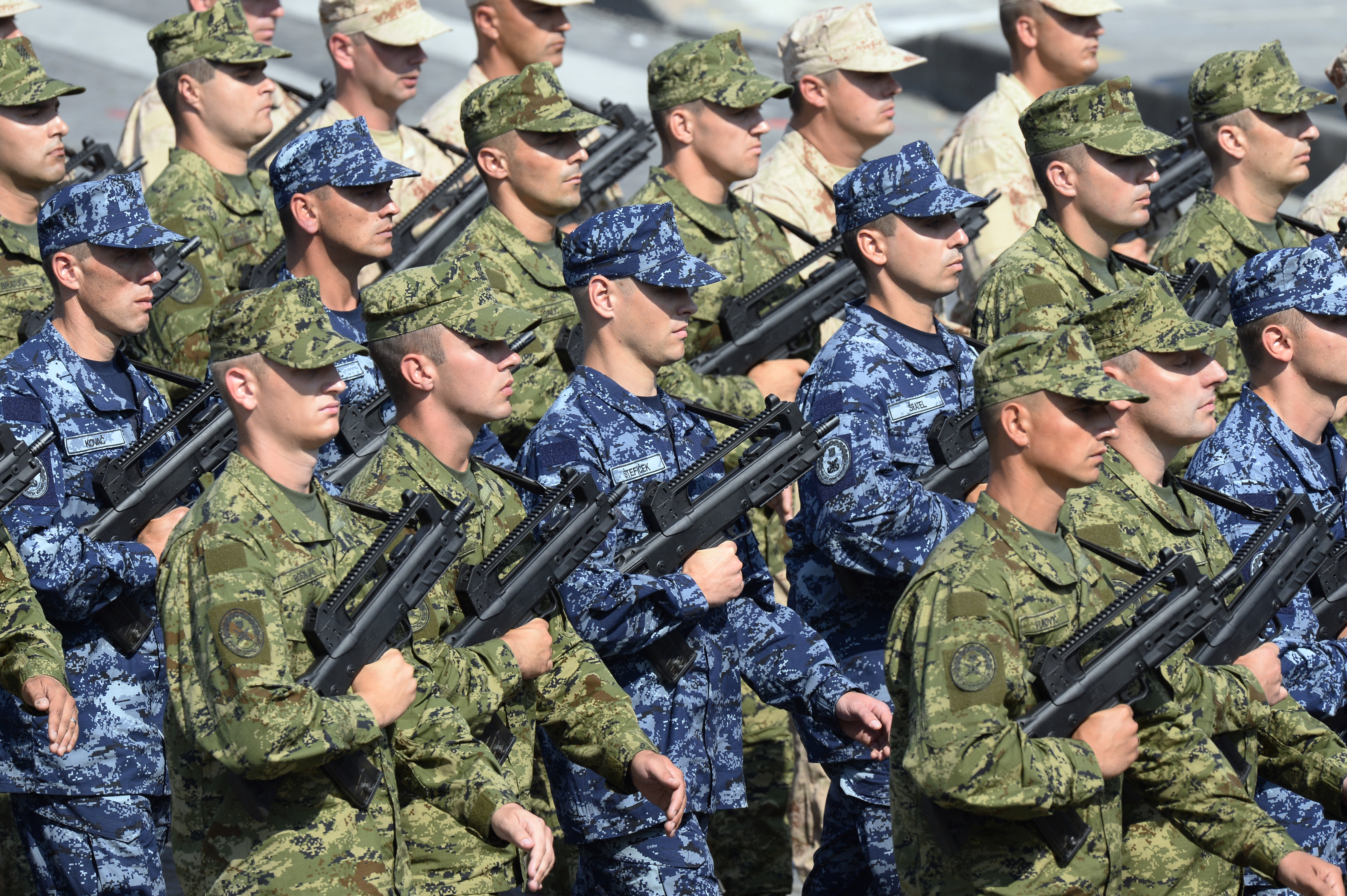 Croatian soldiers march during the Bastille Day parade on the Champs Elysees avenue, on July 14, 2013 in Paris.  AFP PHOTO / LIONEL BONAVENTURE (Photo by LIONEL BONAVENTURE / AFP)