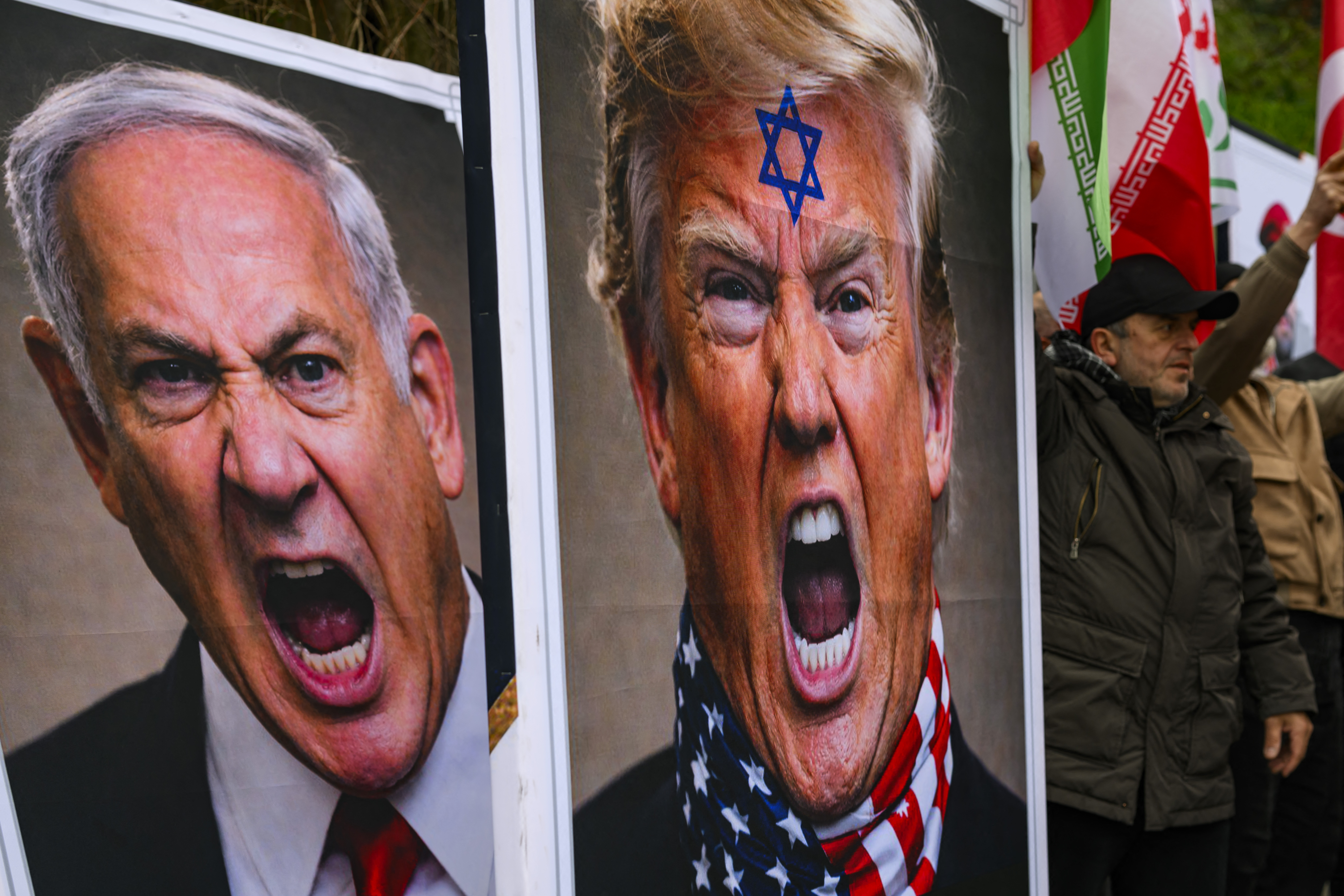 Protesters hold pictures showing US President Donald Trump and Israeli Prime Minister Benjamin Netanyahu during an anti USA demonstration in front of the US consulate in Istanbul, on Febuary 1, 2026.