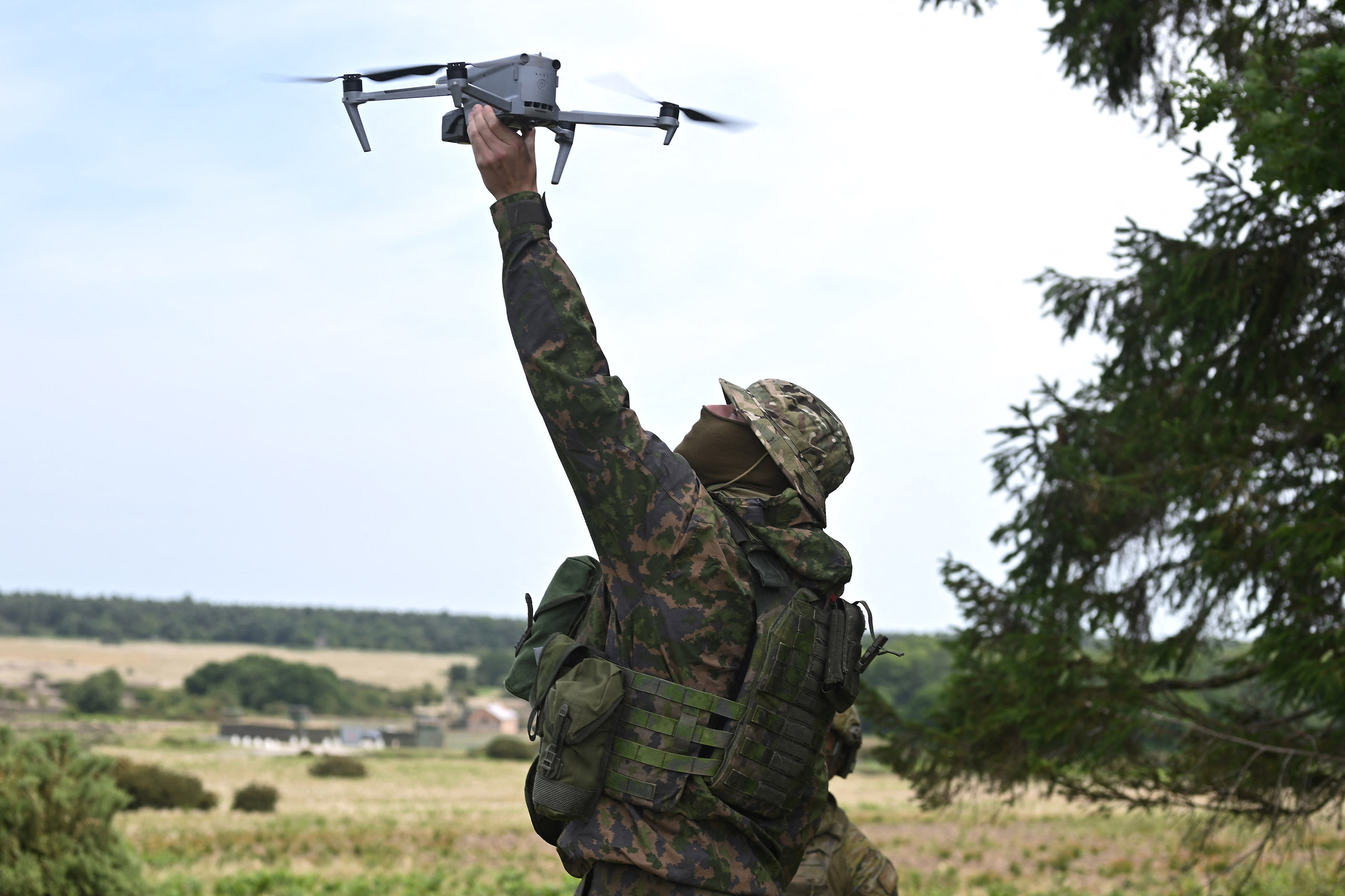 Australian troops demonstrate drone flying during a training excercise for Ukrainian troops, operated by Britain's armed forces as part of the Interflex programme, in eastern England, on June 17