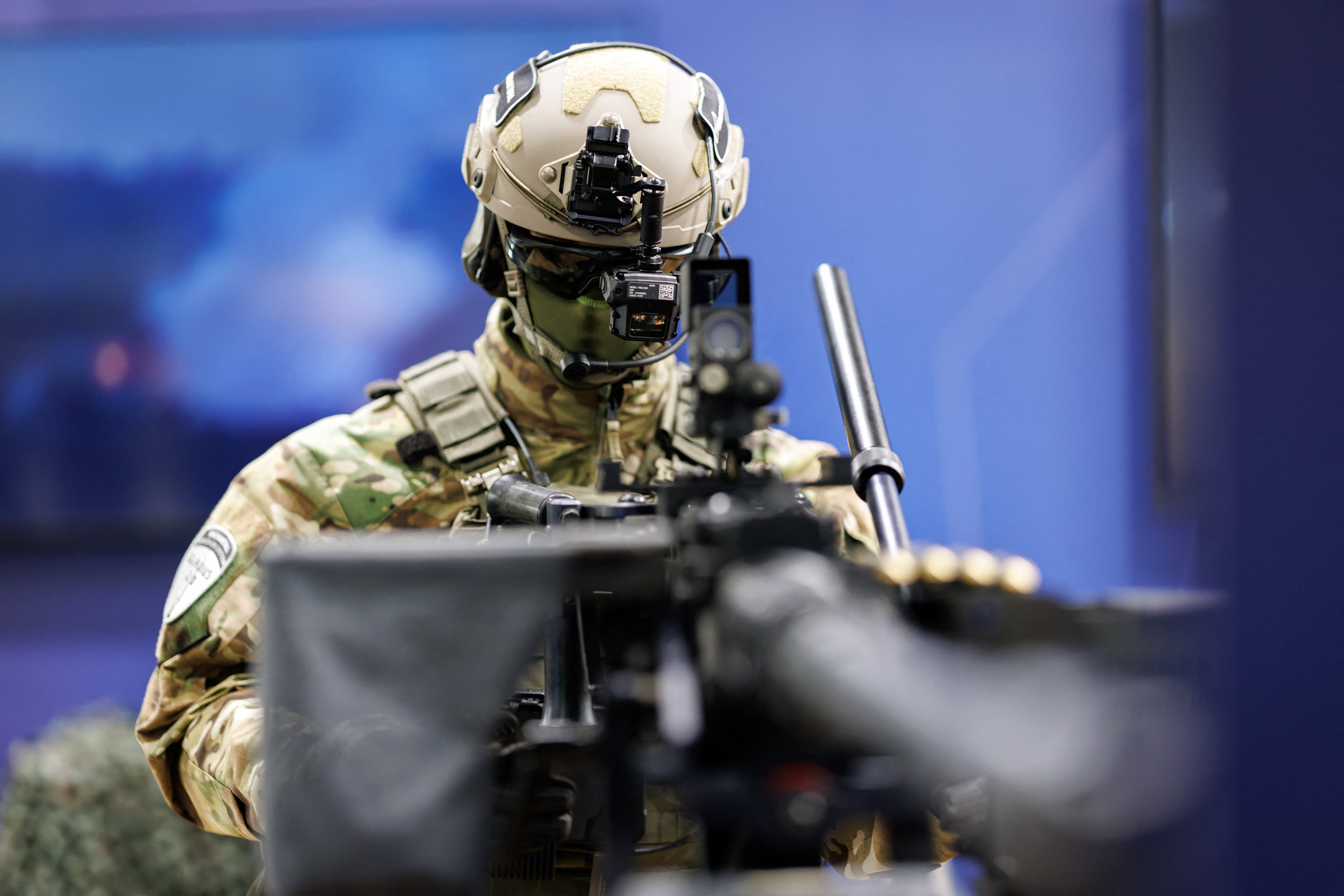 A mannequin equipped with the Gladius 2.0 soldier system is on display at the Rheinmetall defence company's stand during the "Enforce Tac" trade fair for security and defence in Nuremberg, southern Germany on February 25, 2026