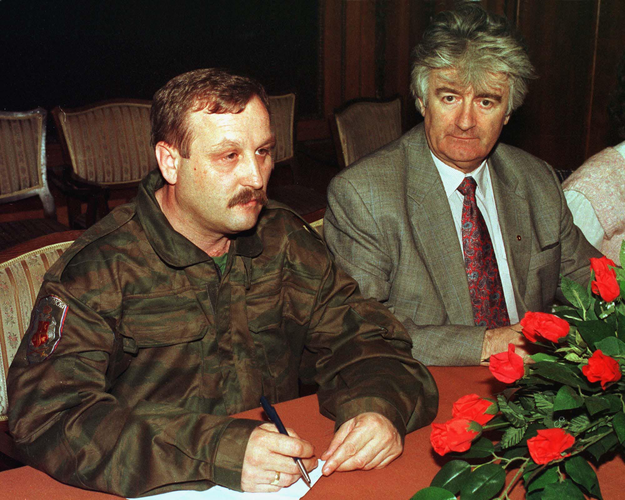 FILE-This is undated FILE photo of  Milan Martic,left, Croatian Serb leader during 1991-1995 war. At right is Radovan Karadzic. (AP PHOTO / fls)
