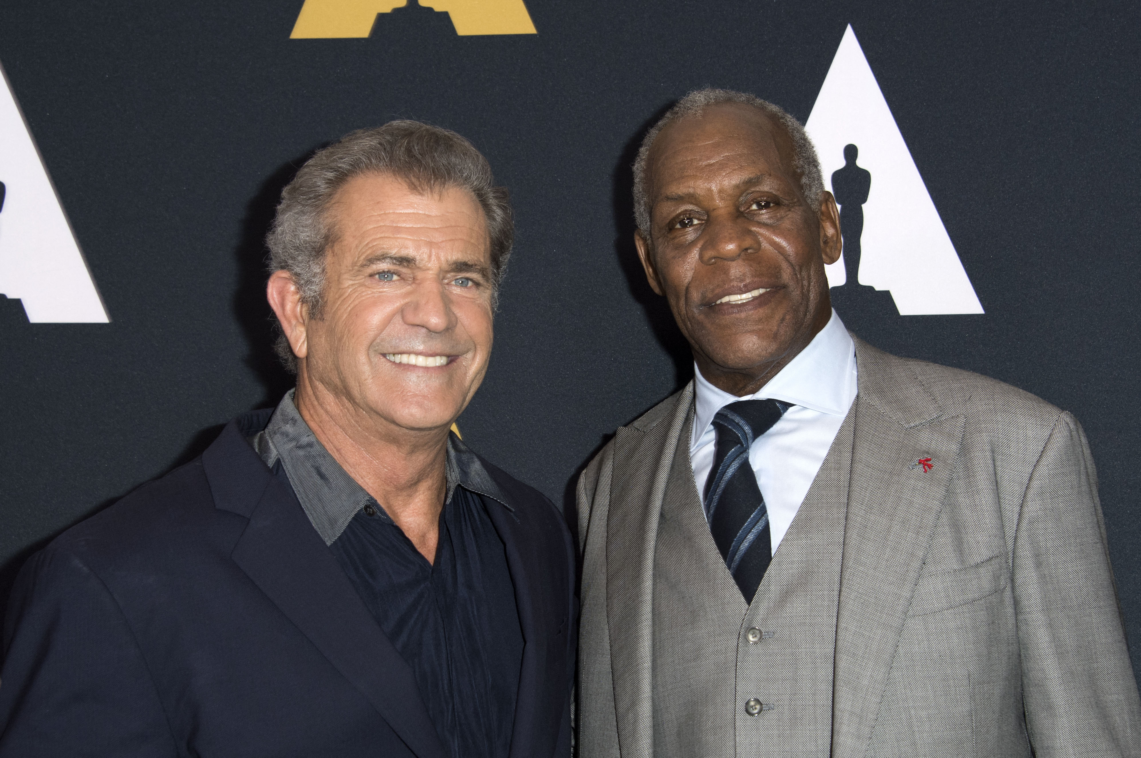 Actors Mel Gibson and Danny Glover. (Photo by VALERIE MACON / AFP)