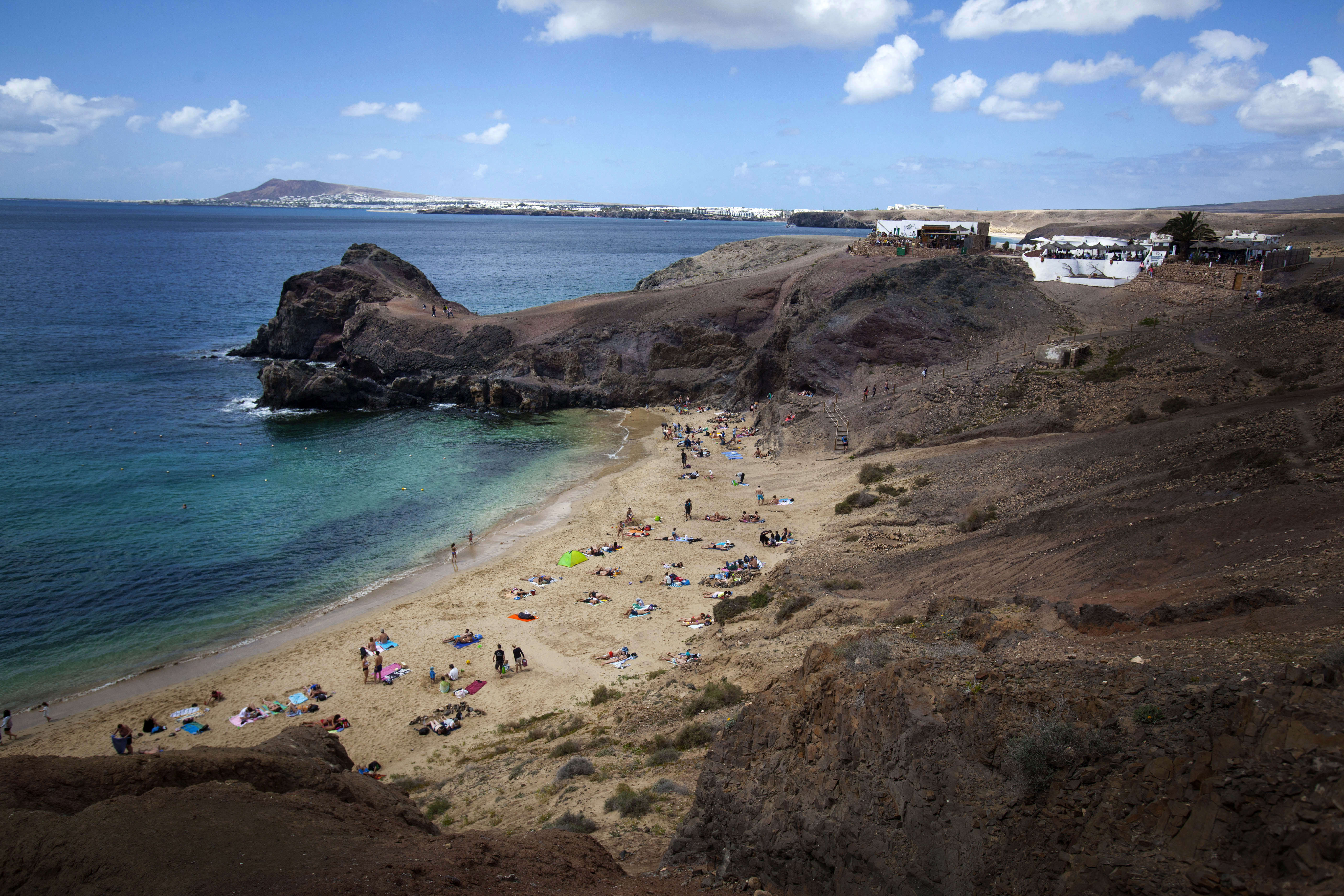 General view of Papagayo beach on the Spanish Canary island of El Lanzarote on March 23, 2016. (Photo by DESIREE MARTIN / AFP)