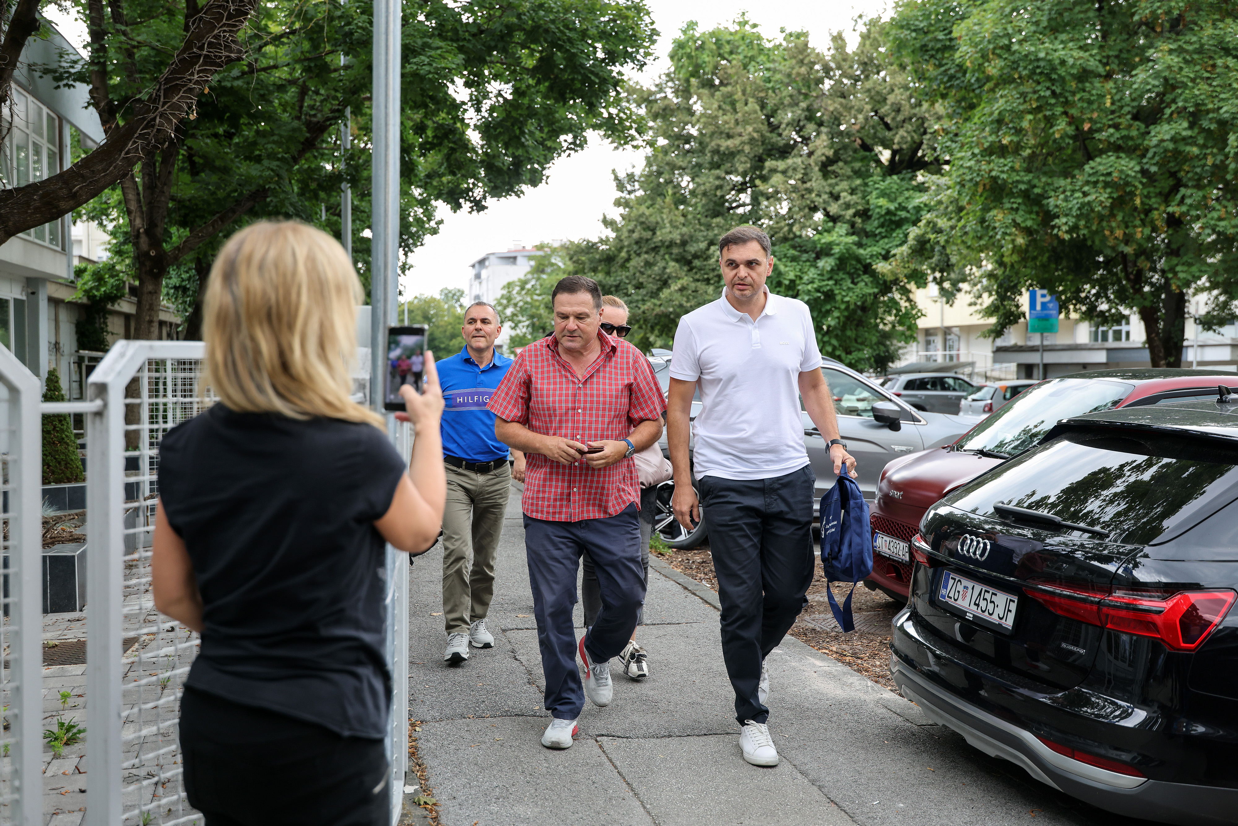 Istrazitelji dovode uhicenog Damira Segotu u pretres ureda u HOO. Photo: Emica Elvedji/PIXSELL