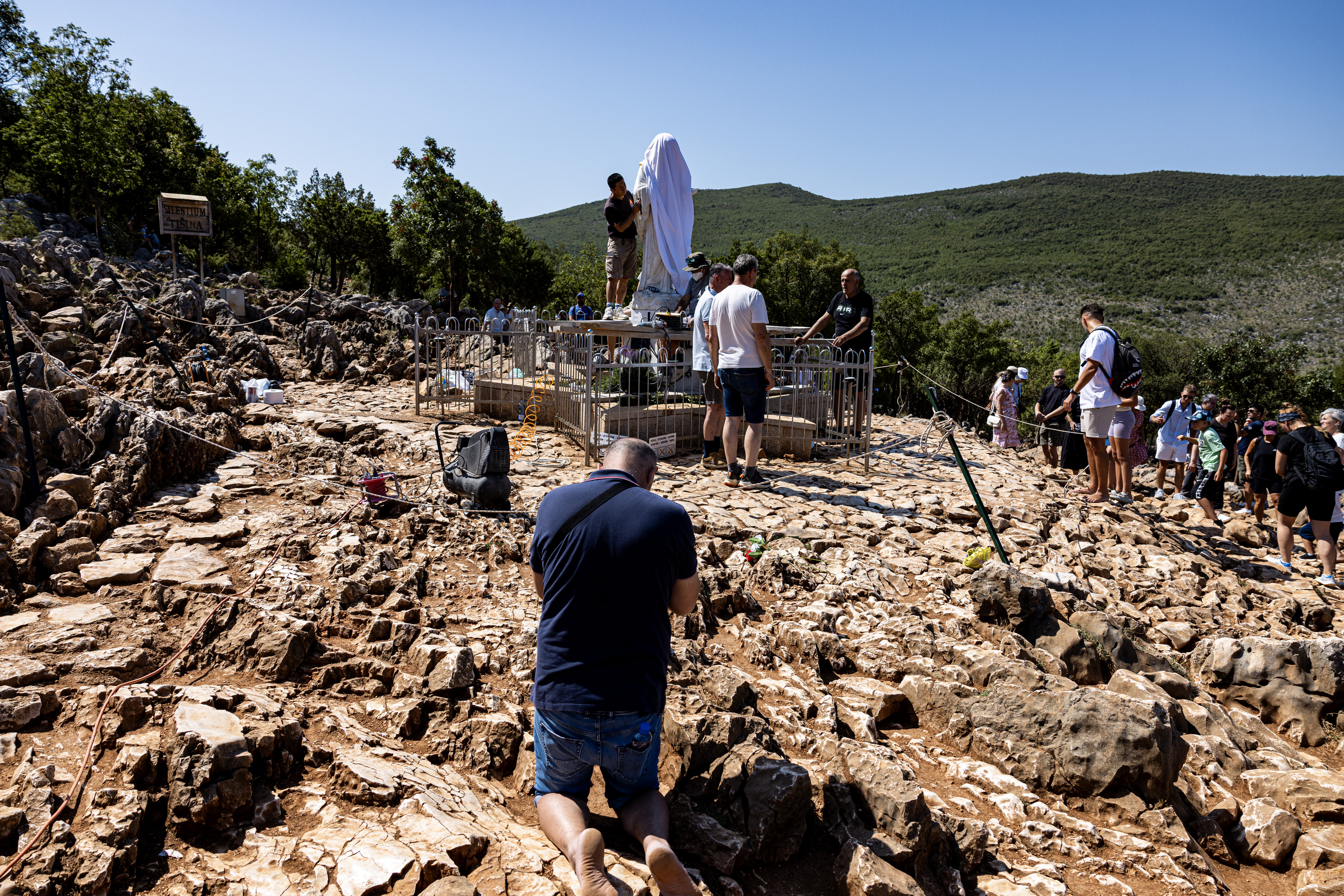 28.07.2026., Medjugorje, Bosna I Hercegovina - Oskvrnuti Gospin kip na brdu ukazanja. Sticenici zajednice Cenacolo rade na sanaciji. Photo: Denis Kapetanovic/PIXSELL