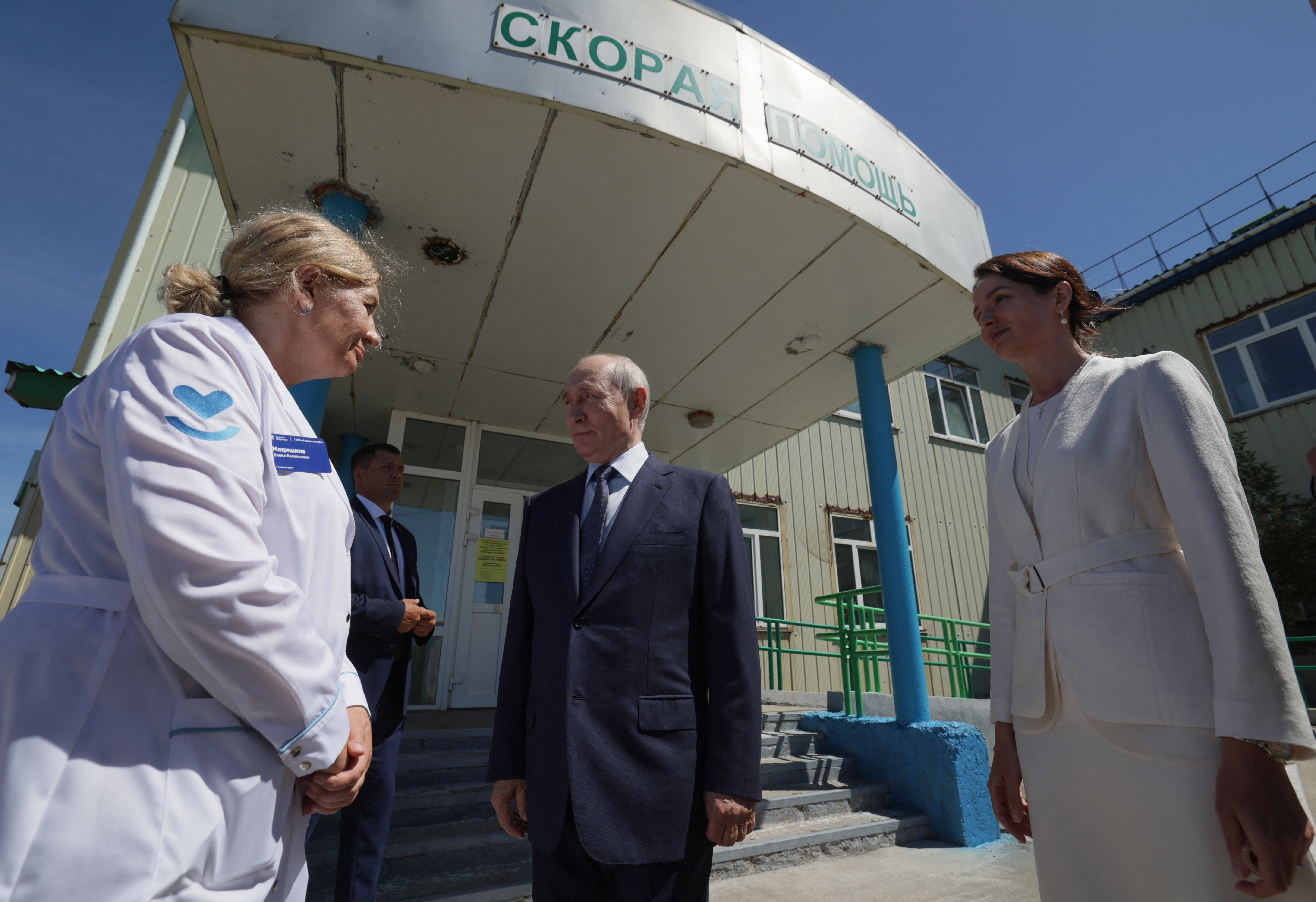 Russia's President Vladimir Putin visits a hospital on Iturup island, one of four islands in the contested chain known as the Kuril Islands in Russia and the Northern Territories in Japan
