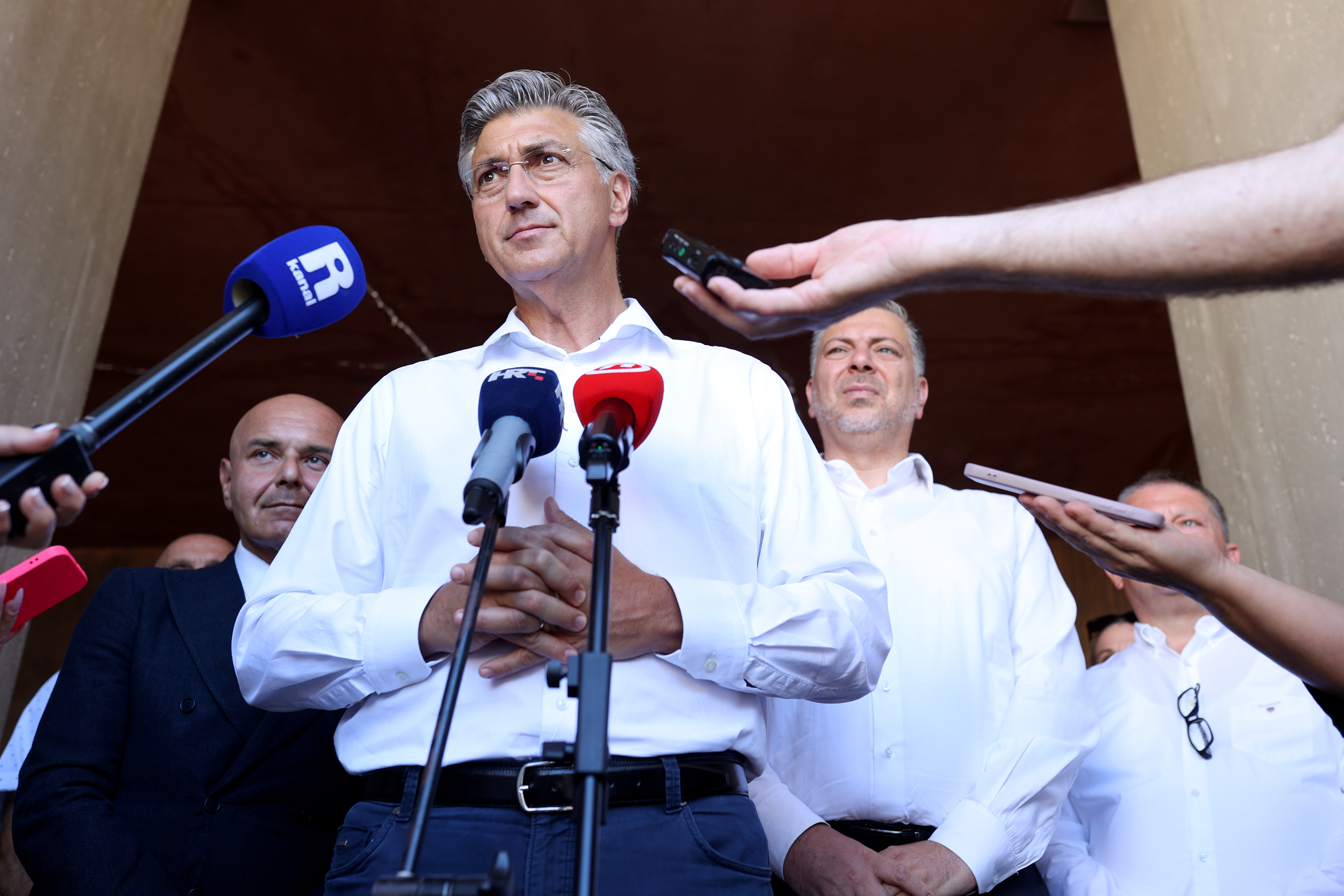 15.08.2026., Rijeka - Na blagdan Velike Gospe odrzano je sredisnje misno slavlje, zavjetna misa Rijecke nadbiskupije i grada Rijeke, na Trsatu. Alen Ruzic, predsjednik Vlade RH Andrej Plenkovic i Josip Ostrogovic Photo: Nel Pavletic/PIXSELL