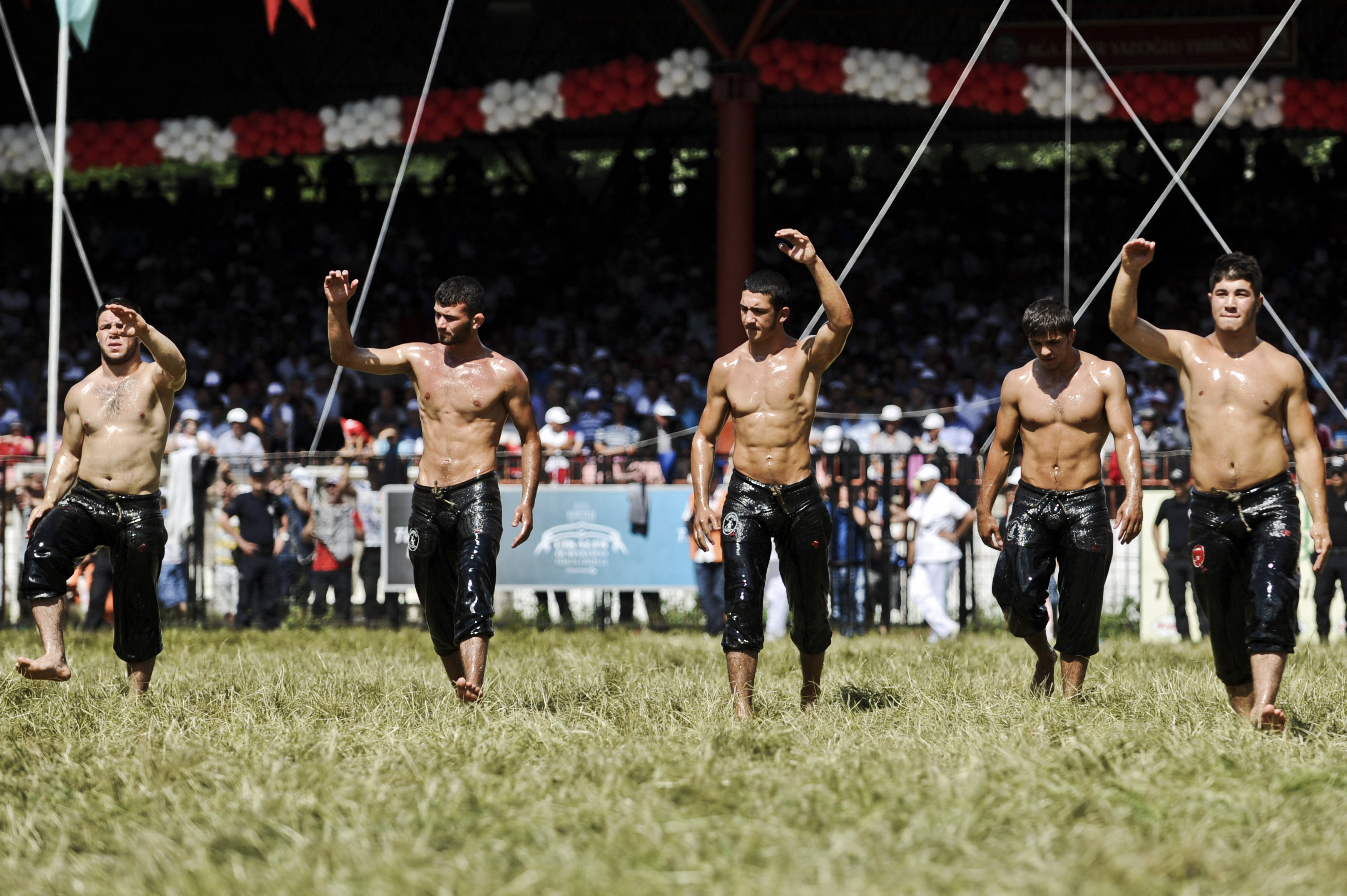 Kirkpinar oil wrestling tournament. AFP PHOTO / OZAN KOSE (Photo by Ozan KOSE / AFP)