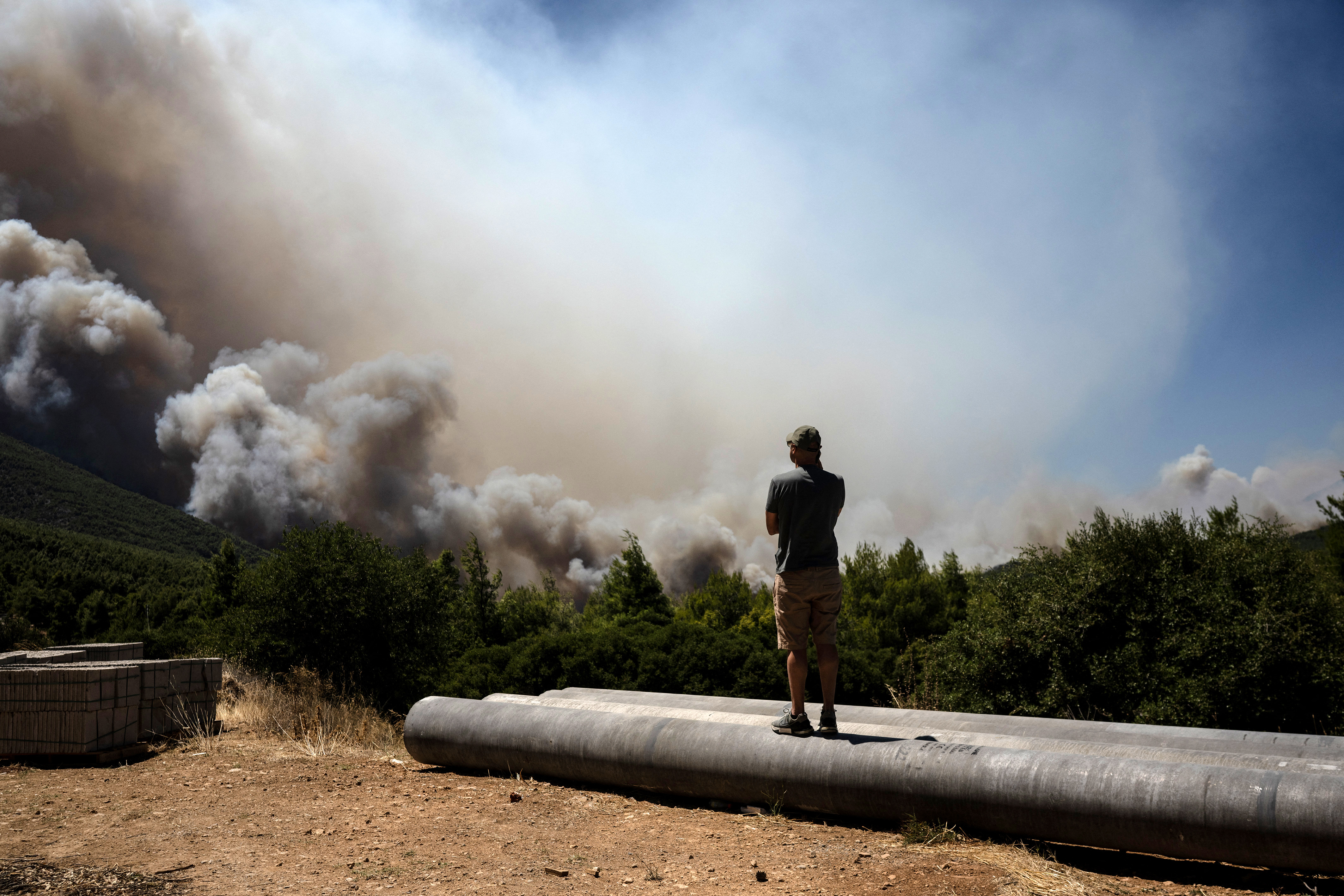 ildfire in the area of Porto Germeno. (Photo by Angelos TZORTZINIS / AFP)