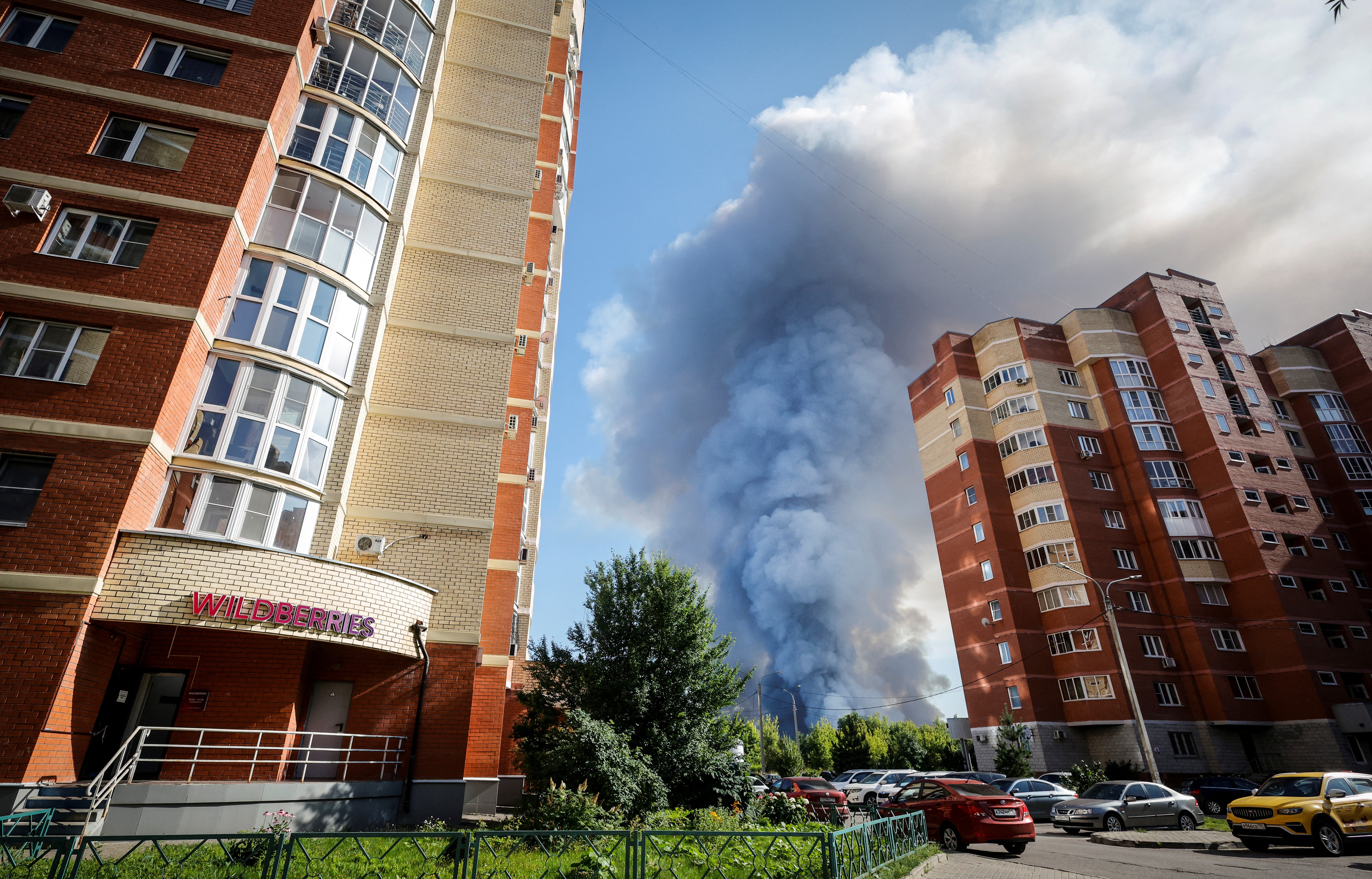 This photograph shows smoke rising from a fire at the Russian e-commerce firm Wildberries'. (Photo by TATYANA MAKEYEVA / AFP)