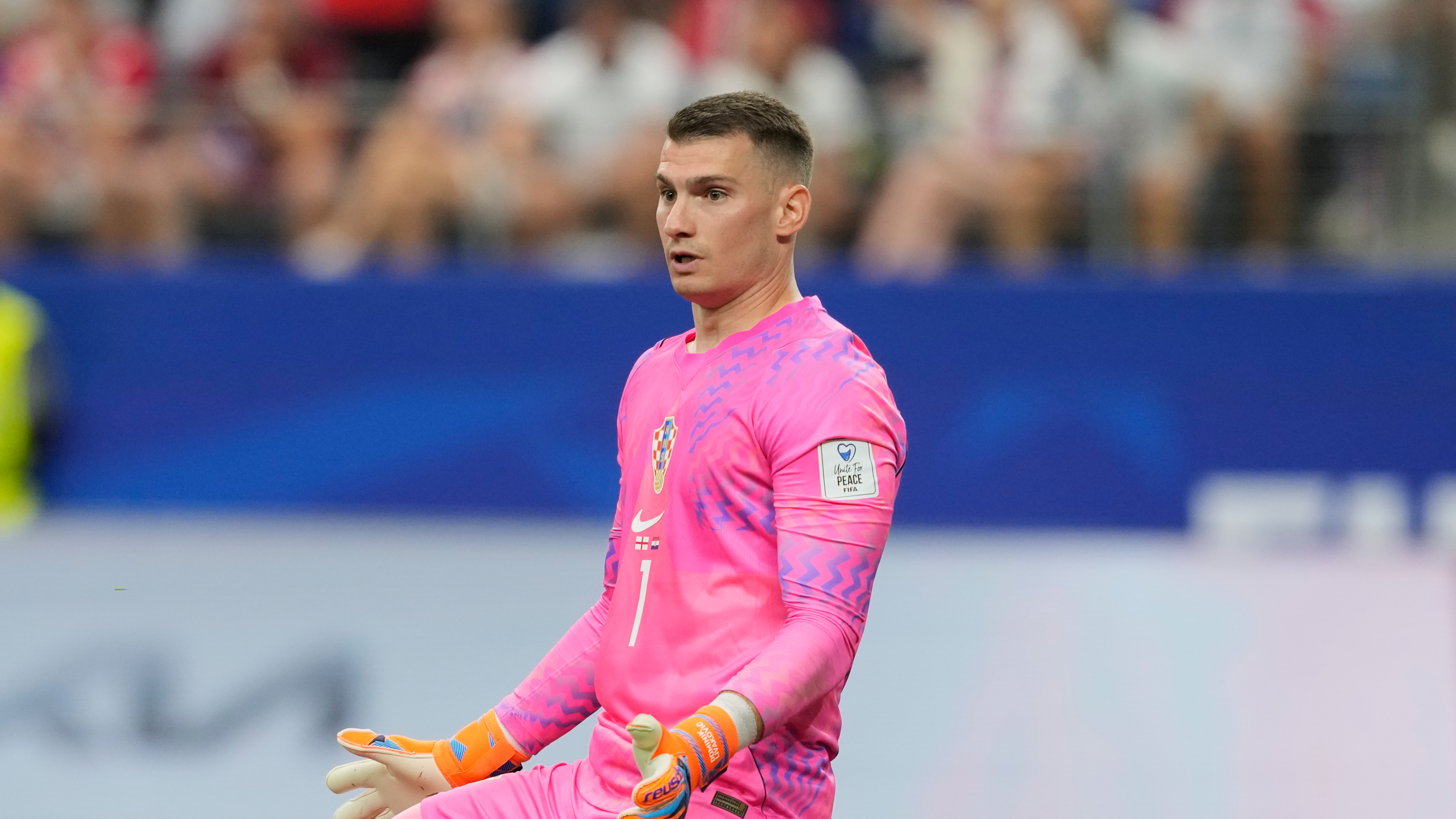Croatia goalkeeper Dominik Livakovic (1) in action during the World Cup Group L soccer match between England and Croatia in Arlington, Texas, near Dallas, Wednesday, June 17, 2026. (AP Photo/Tony Gutierrez)