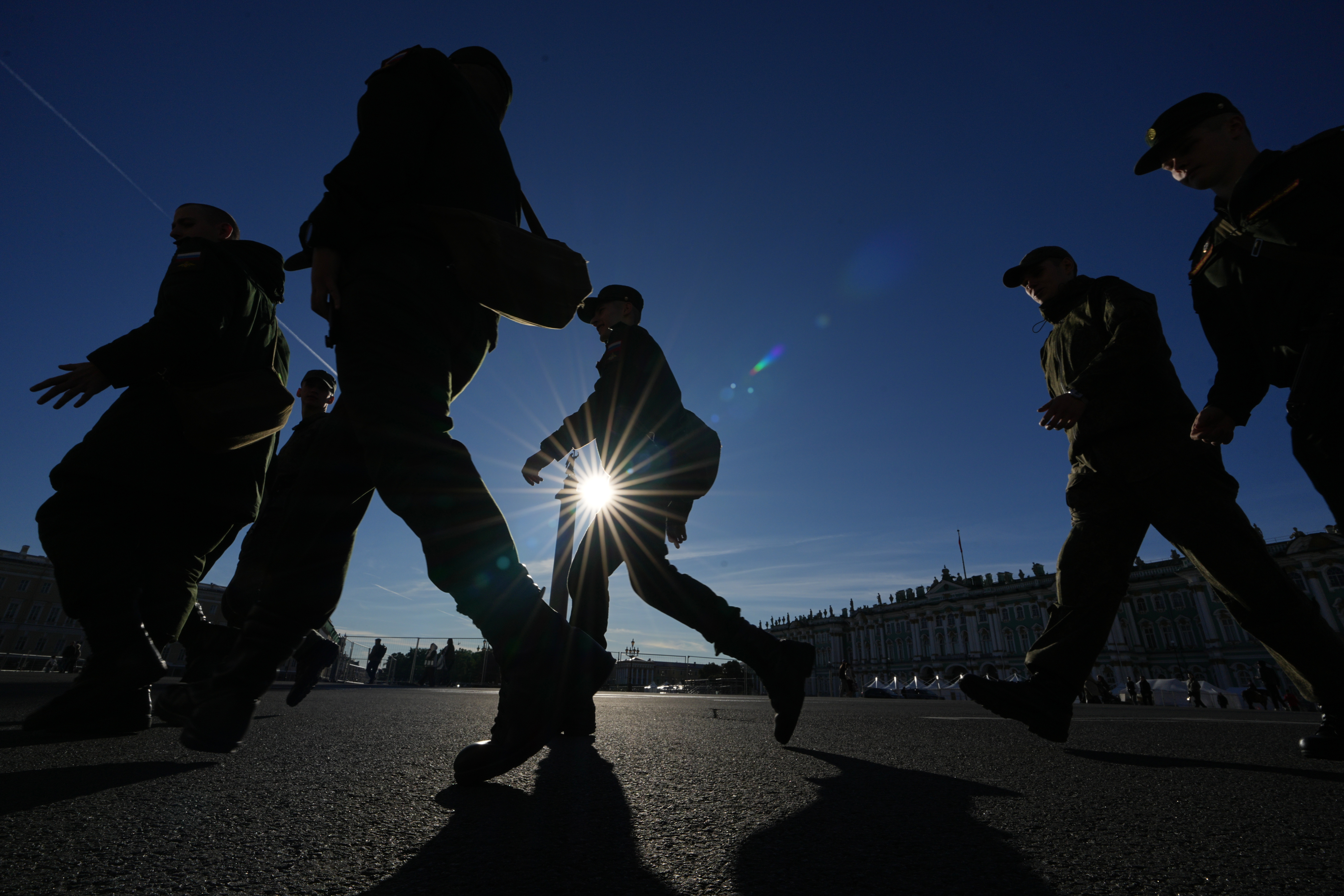 Soldiers walk through the Palace Square in St. Petersburg. (AP Photo/Dmitri Lovetsky)